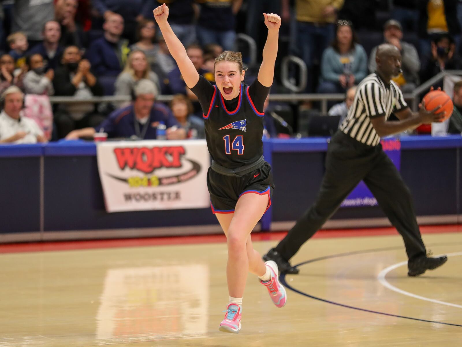 Tri-Village High School senior Morgan Hunt celebrates after the Patriots beat Toledo Christian 52-50 on Saturday afternoon at University of Dayton Arena to claim their first girls basketball state championship in school history. CONTRIBUTED PHOTO BY MICHAEL COOPER