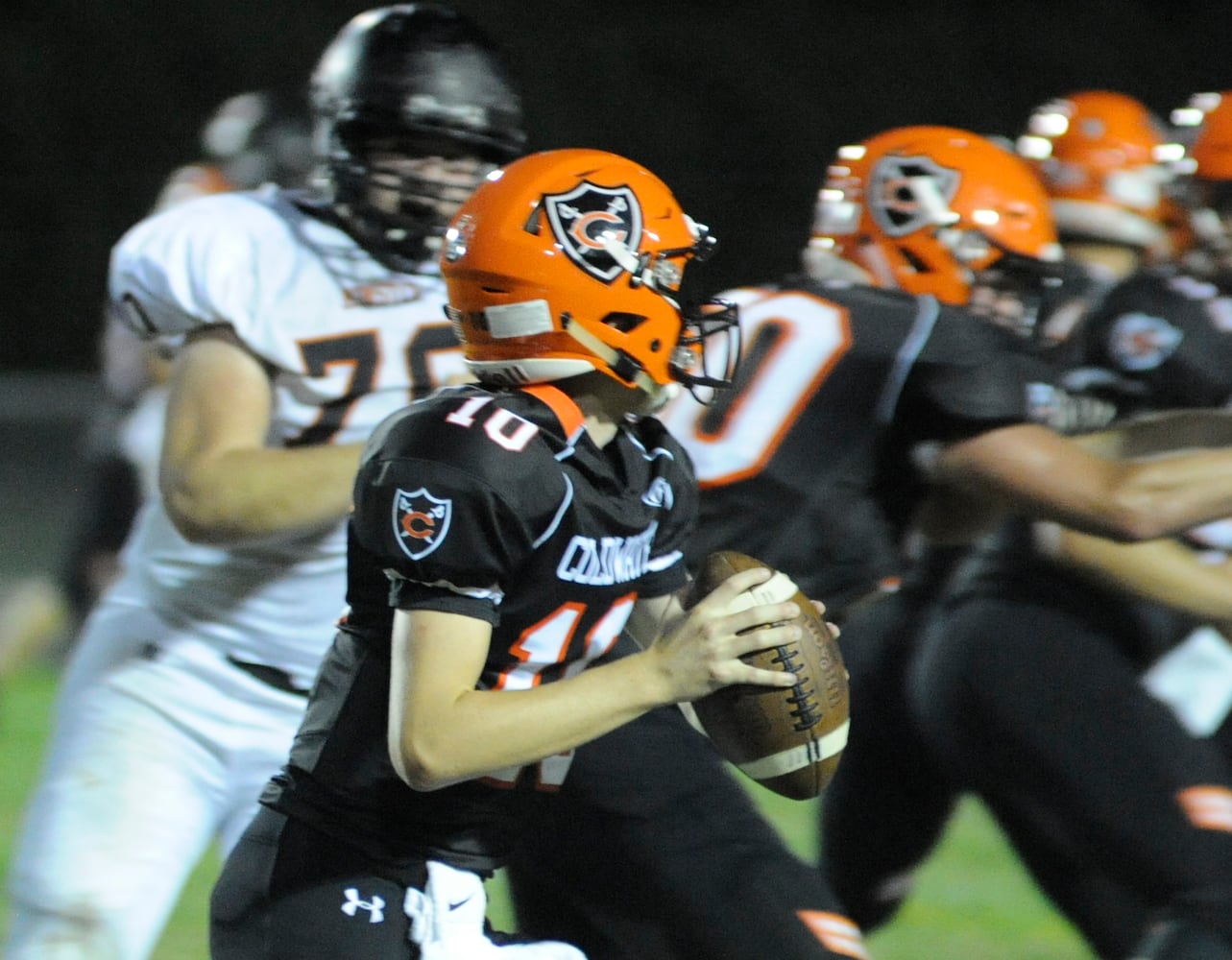 PHOTOS: No. 1 Minster at No. 1 Coldwater, Week 4 football