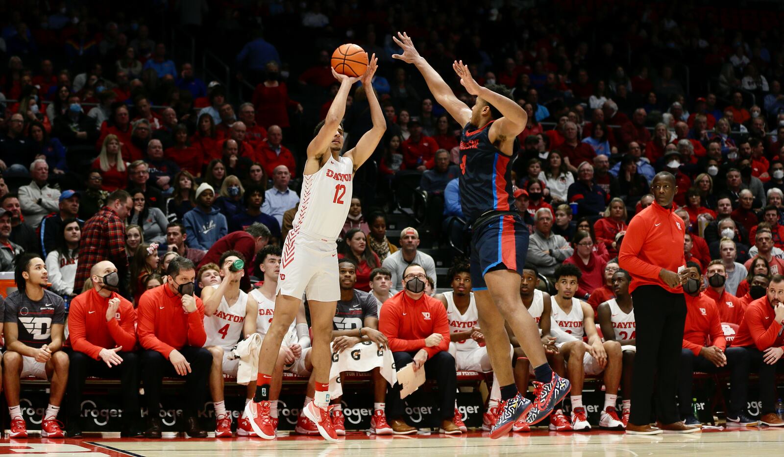 Dayton's Zimi Nwokeji shoots against Duquesne on Wednesday, Feb. 9, 2022, at UD Arena. David Jablonski/Staff