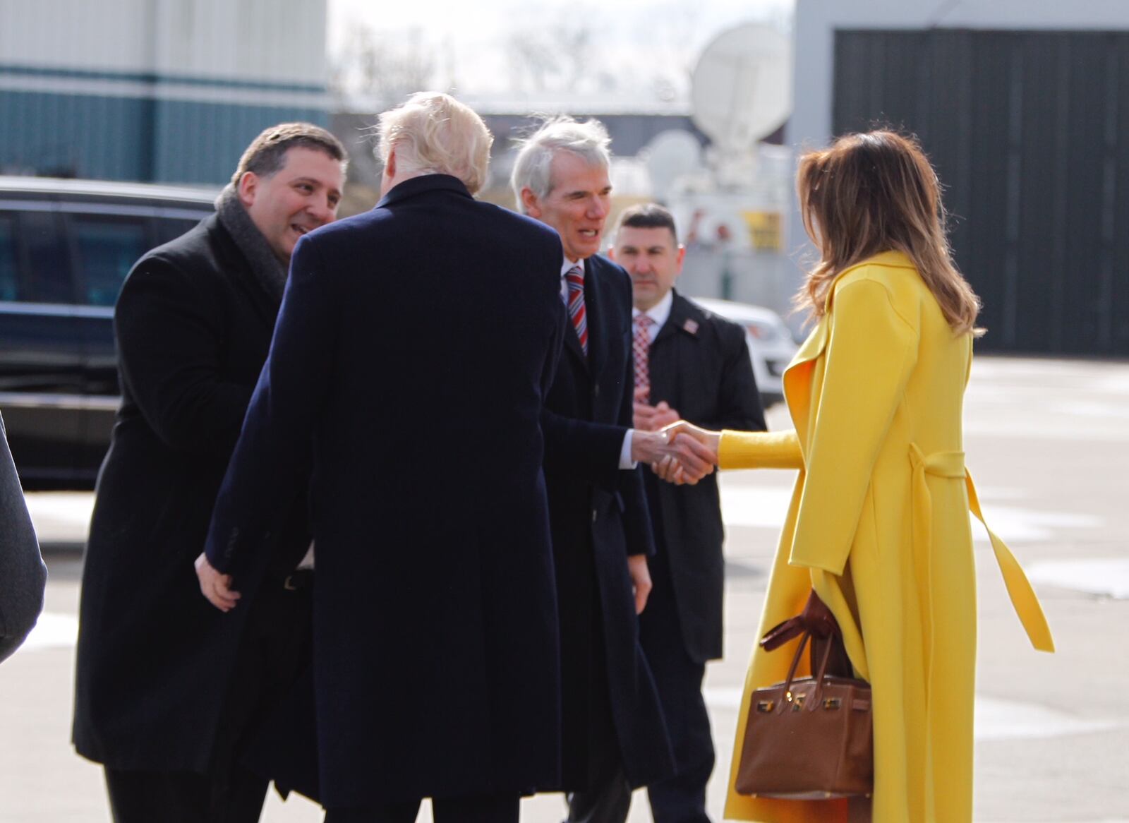 President Donald Trump and Melania Trump meet with Senator Rob Portman at Lunken Airport in Cincinnati. Photo by Lisa Powell.