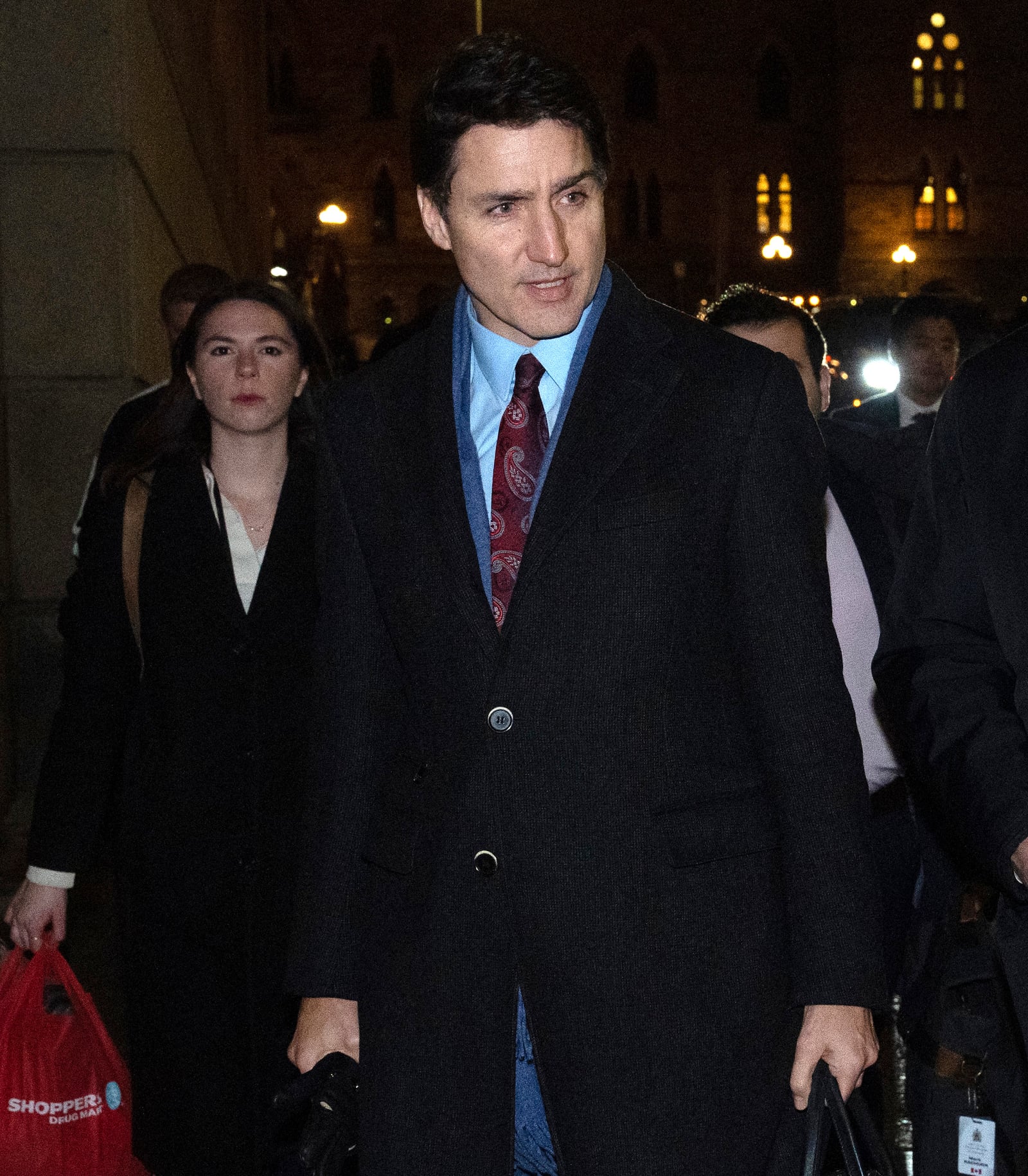 Canadian Prime Minister Justin Trudeau makes his to a national caucus meeting, in Ottawa, Ontario, Monday, Dec. 16, 2024. (Adrian Wyld/The Canadian Press via AP)