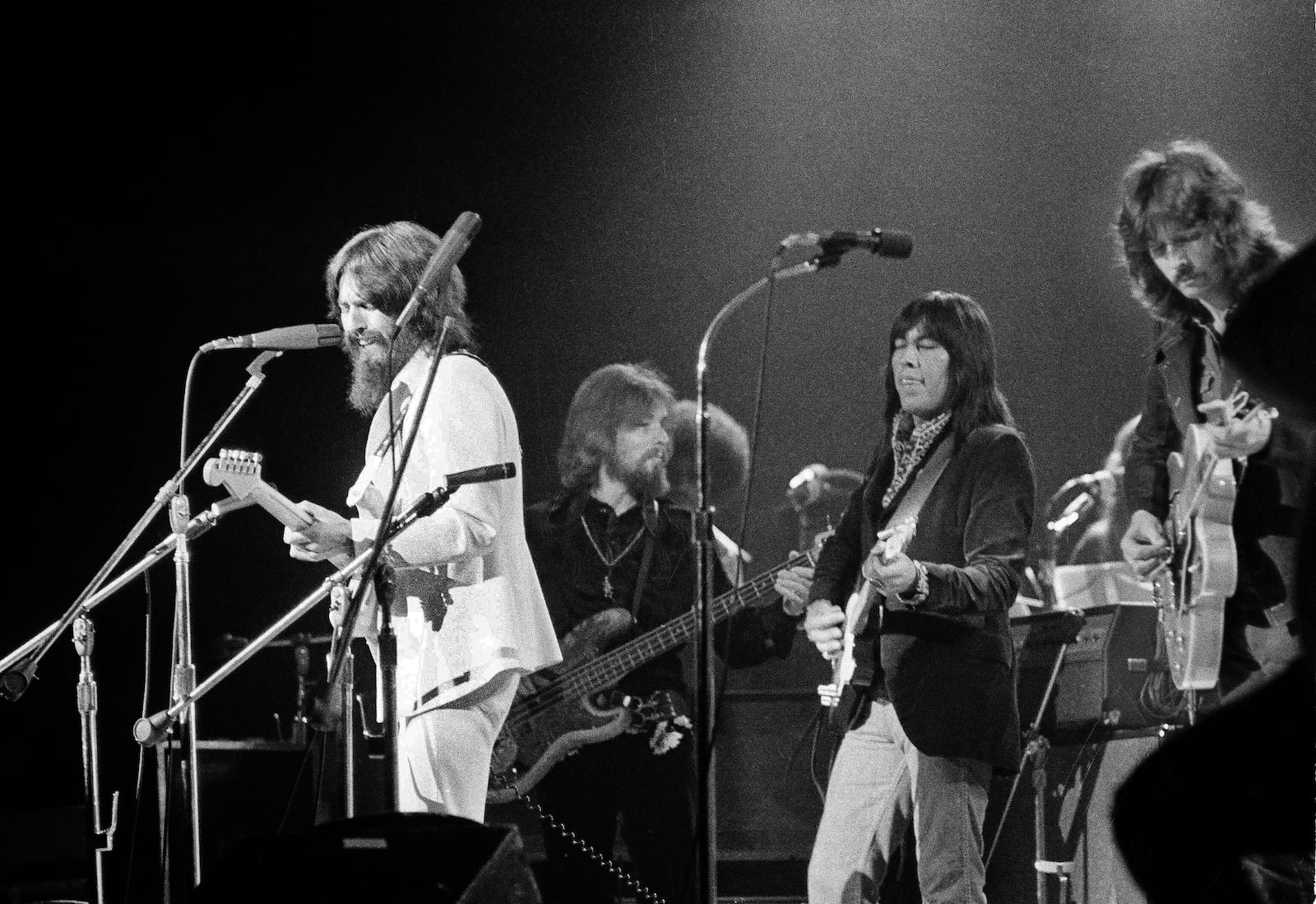 FILE - Jesse Ed Davis, center right, a guitarist of Kiowa and Comanche ancestry, performs with George Harrison, left, formerly of the Beatles, at the Concert For Bangladesh at Madison Square Garden in New York on Aug. 1, 1971. (AP Photo/Jim Wells, File)