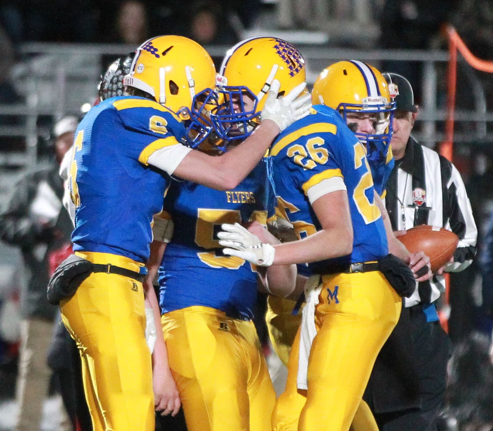 Trent Pleiman (left), Braden Topp (middle) and Blake Schwieterman have helped Marion Local make its ninth consecutive state title appearance when the Flyers play Lucas at Canton on Saturday. MARC PENDLETON / STAFF