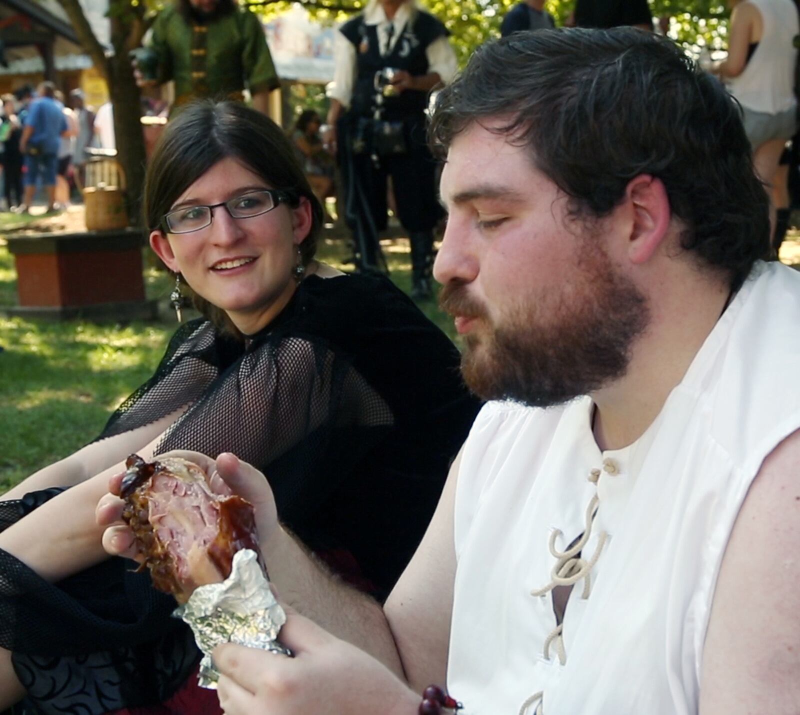 Giant turkey legs are a Medieval favorite at the Ohio Renaissance Festival.   TY GREENLEES / STAFF