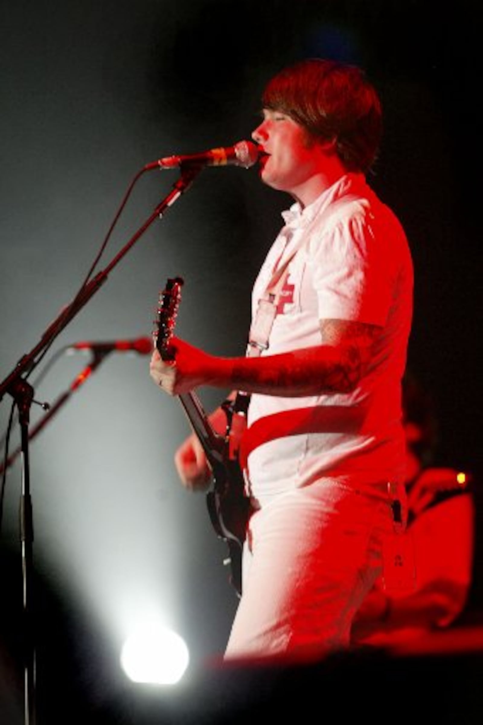 Hawthorne Heights, a band from Dayton, took the stage at Hara Arena Sunday night during The Black Clouds and Underdogs Tour. Singing is frontman JT Woodruff. The headliner for the show was Fall Out Boy. Photo by Lisa Powell