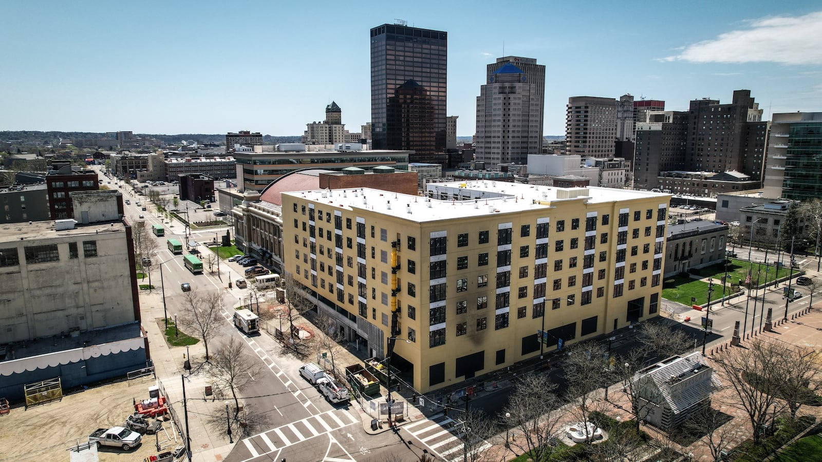 After delays, new apartments buildings in downtown Dayton are now taking shape like this one at Monument Avenue and North St. Clair Street. JIM NOELKER/STAFF