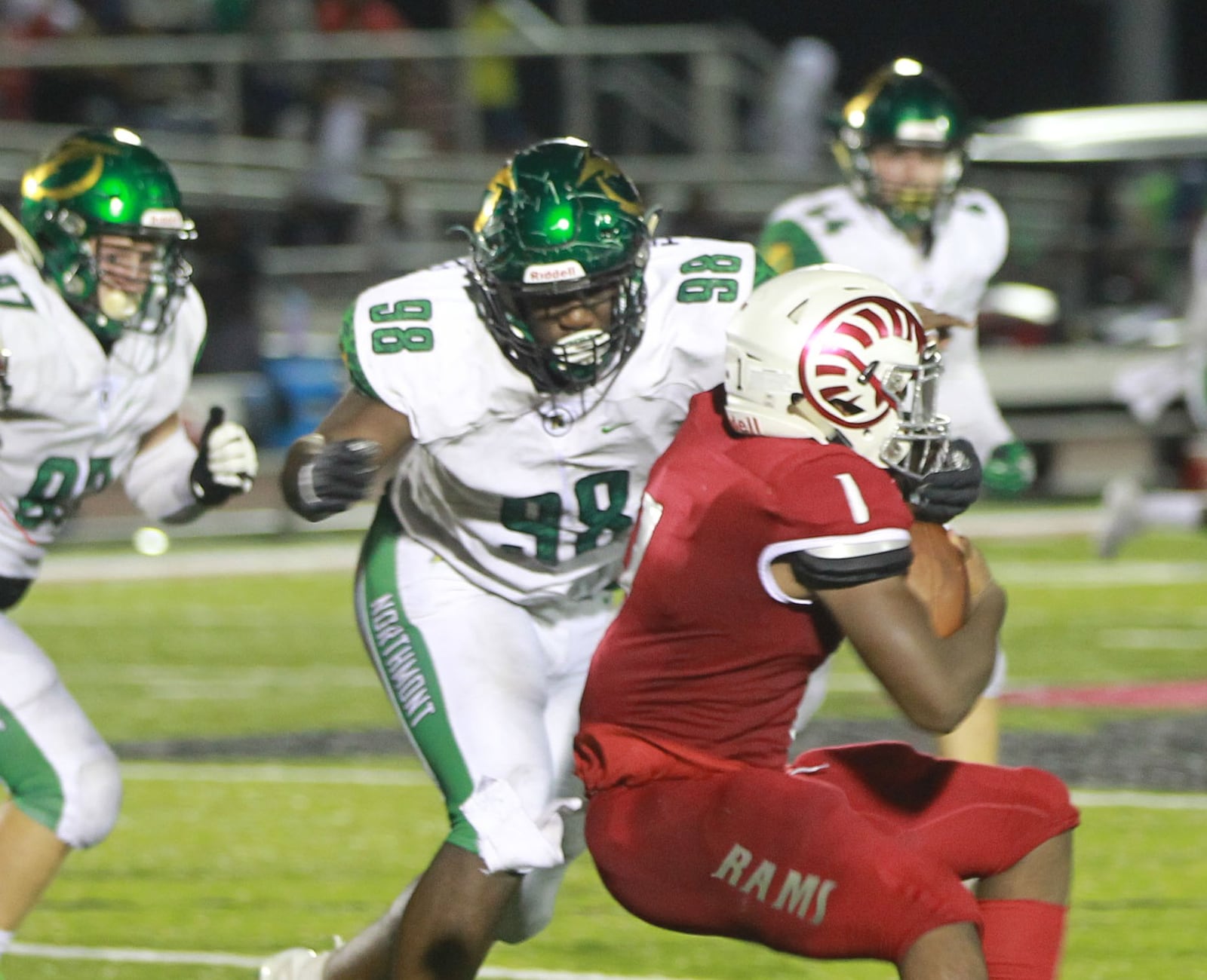 Trotwood-Madison QB Keon’tae Huguely (with ball) is met by Charles Warren of Northmont. Trotwood defeated visiting Northmont 20-14 in a Week 5 high school football game on Friday, Sept. 27, 2019. MARC PENDLETON / STAFF