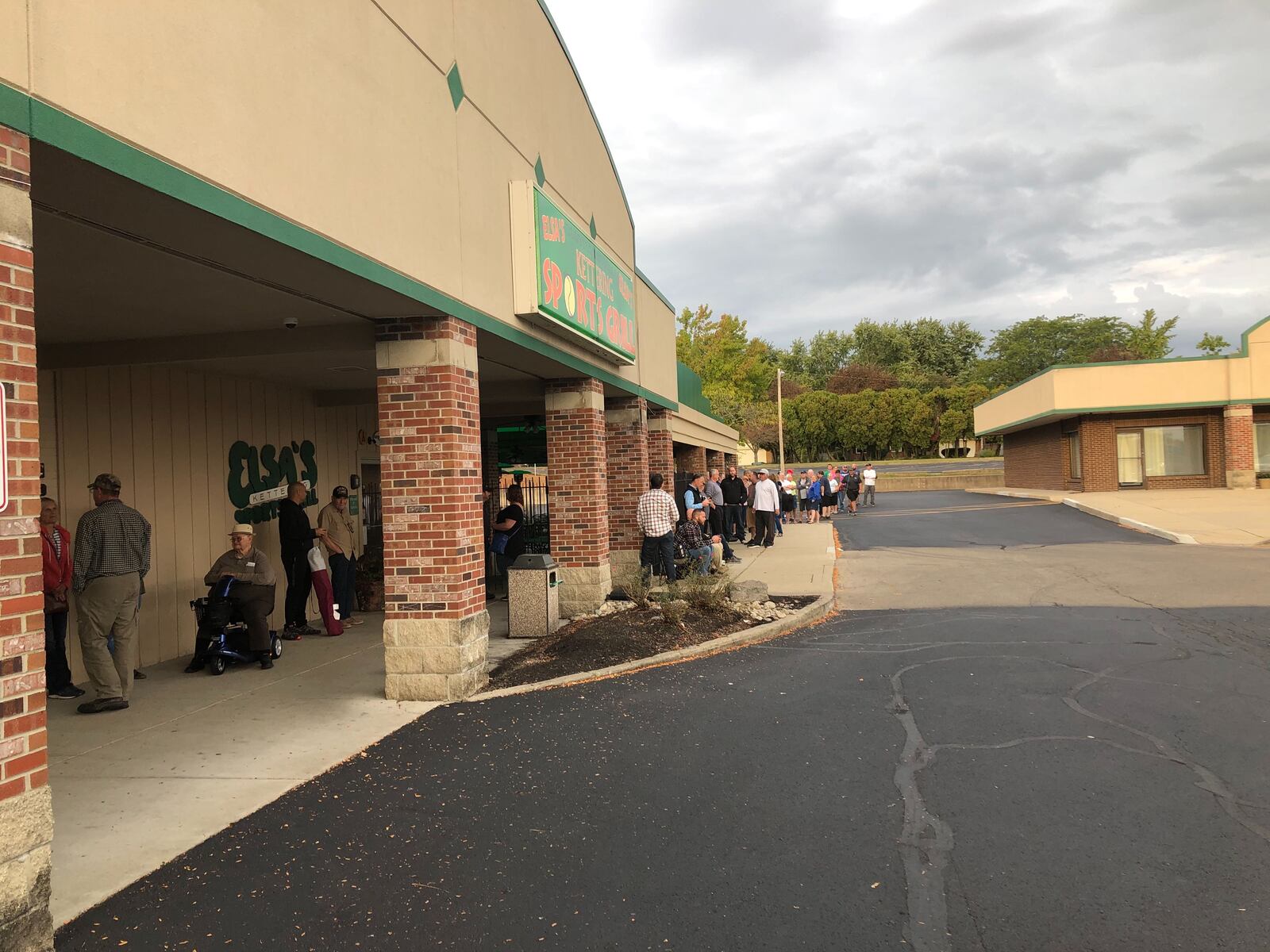 “Discounted” bourbon will go on sale at Kettering Wine &  Spirits, the new 8,200-square-foot store located at 1218 E. Stroop Road in the Fairmont Shopping Plaza next to Elsa’s Kettering Sports Grill on Friday, Oct. 11, 2019. Customers were lined up early for the deal. MARK FISHER/STAFF