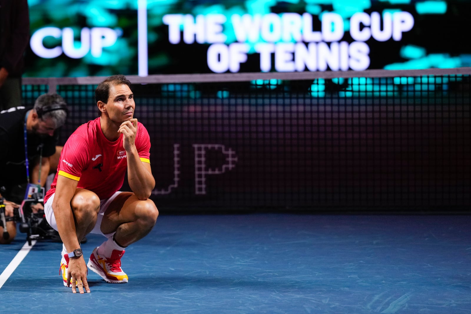 Spain's Rafael Nadal during a tribute after playing his last match as a professional tennis player in the Davis Cup quarterfinals at the Martin Carpena Sports Hall in Malaga, southern Spain, on early Wednesday, Nov. 20, 2024. (AP Photo/Manu Fernandez)