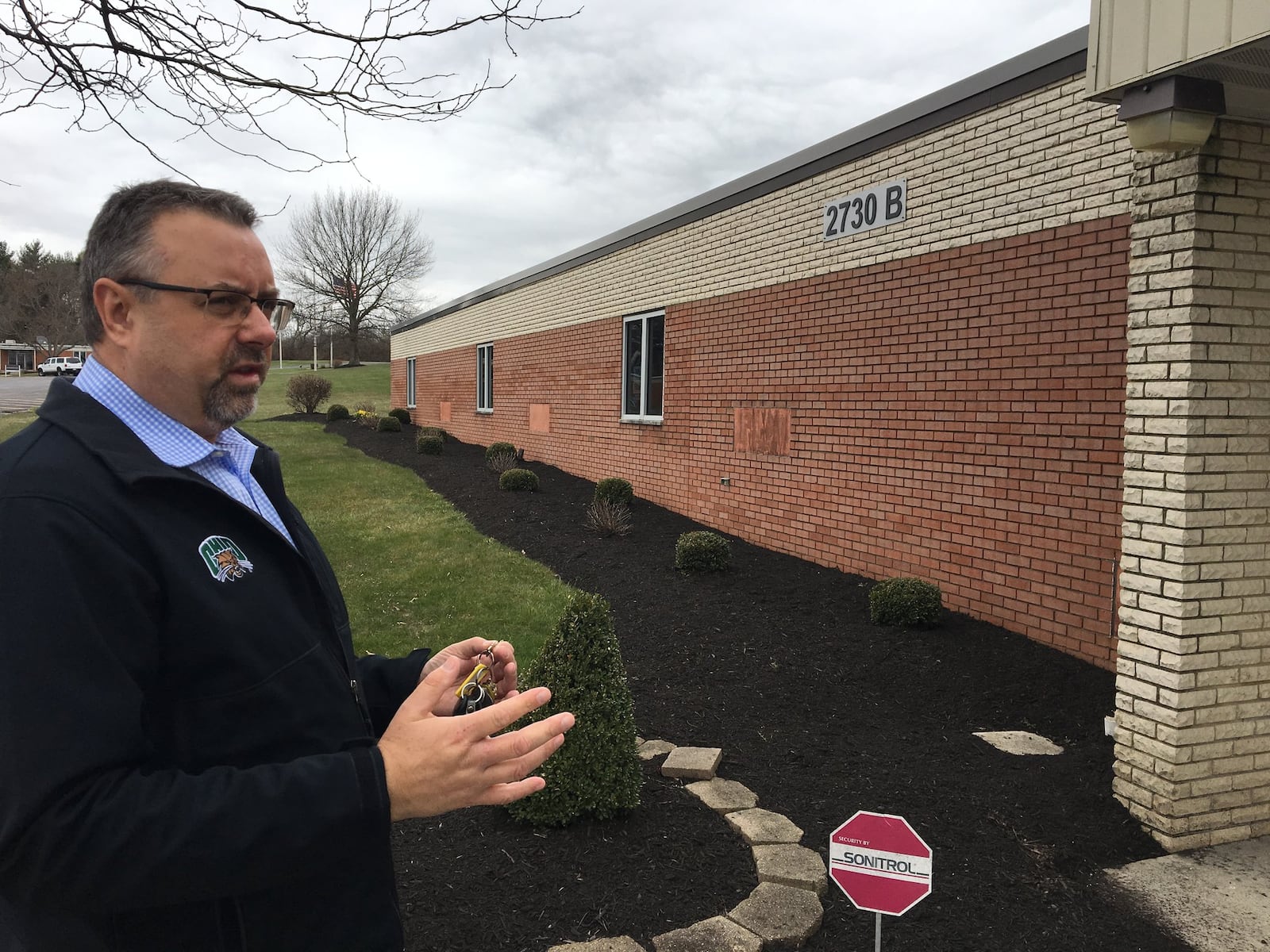 Scott Miller, Ohio University associate dean for industry partnerships, stands outside of a building at the Russ Research Center. Before the COVID pandemic hit, there was a proposal to transform some space into a conference center with classrooms and lab space for the university.