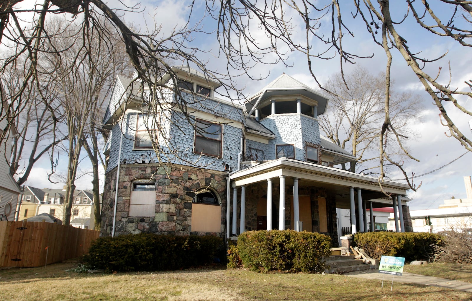 Chris Lewis is rehabbing a historic house in the Dayton View Historic District that once belonged to Gov. James M. Cox. Lewis was selected in August of last year from more than a dozen applicants to receive the home for free from the owner. The Dayton Society of Interior Designers is providing volunteer help with the home with plans to hold a community open house in late fall. LISA POWELL / STAFF