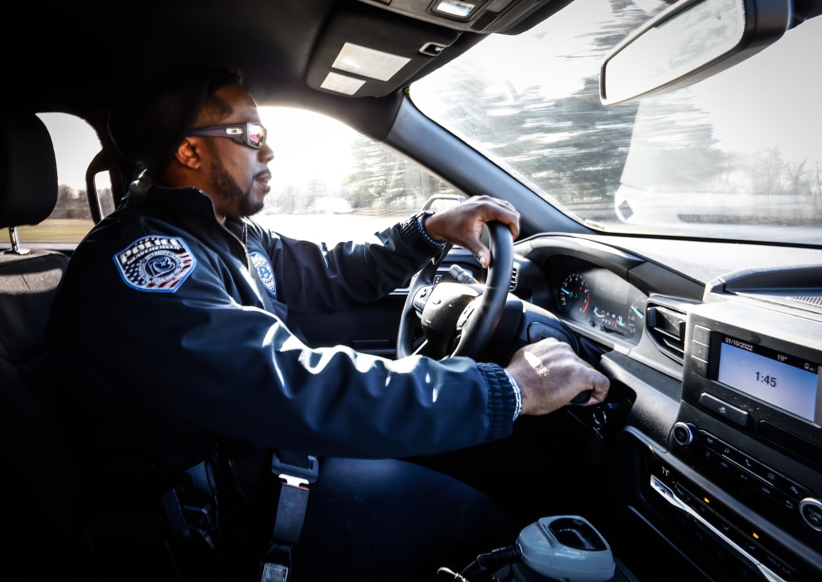 Beavercreek Police Officer, Kris Brownlee patrols a neighborhood near the station on Research Park Dr. JIM NOELKER/STAFF