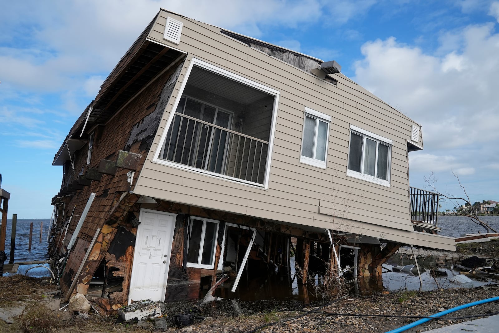 A house lies in ruins after sustaining tornado and flood damage from Hurricane Milton, Thursday, Oct. 10, 2024, in Matlacha, Fla. (AP Photo/Marta Lavandier)