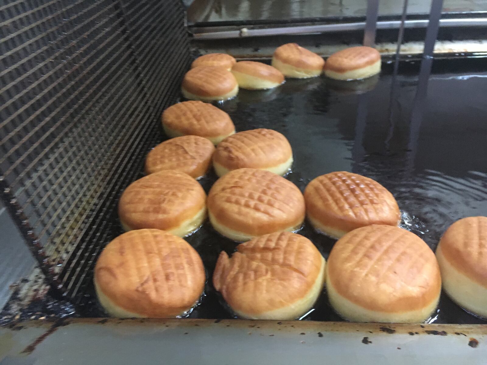 Different from ordinary doughnuts, paczki are made with more eggs and sugar to render a sweeter result.