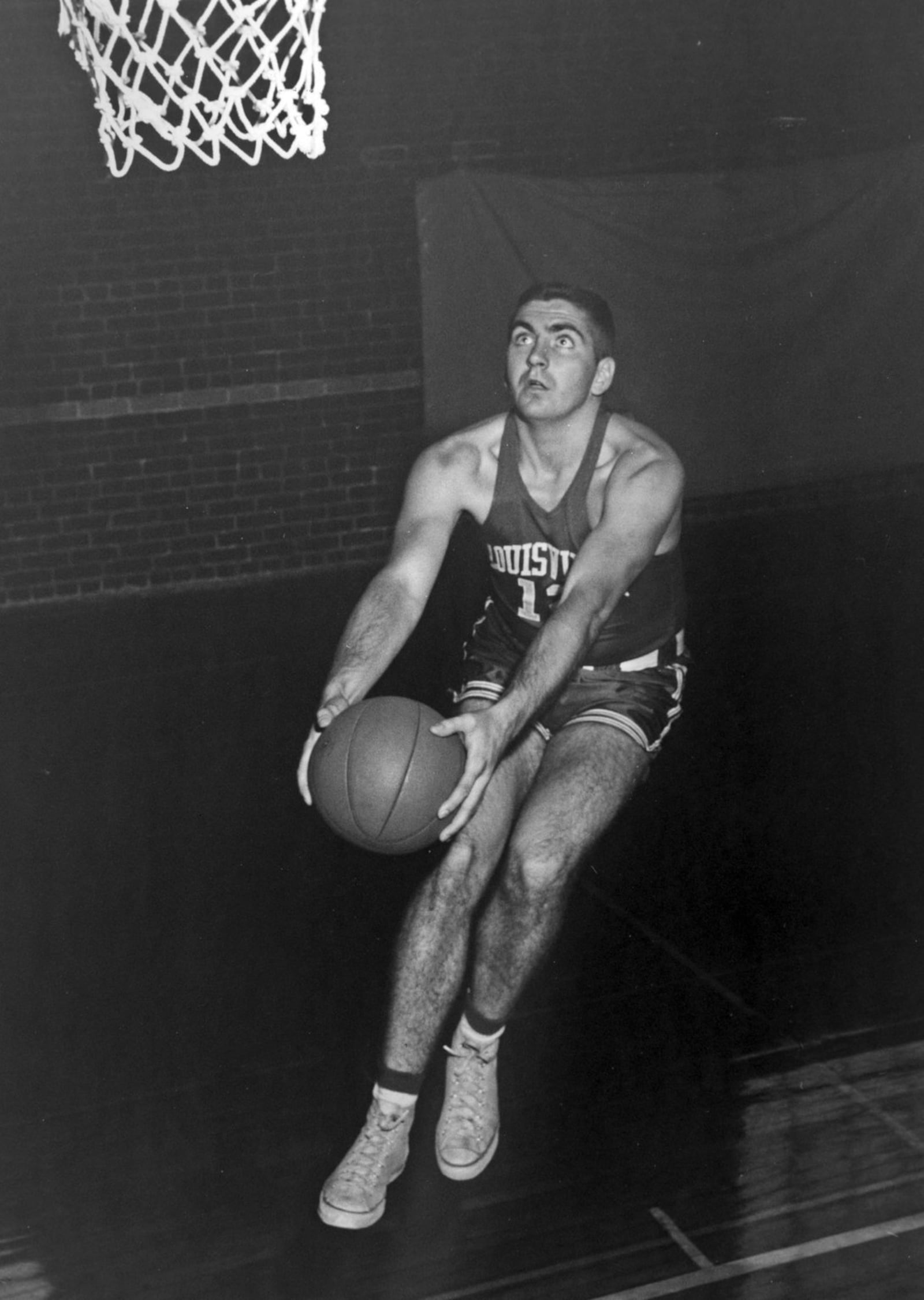 Jim Morgan at Louisville. Morgan became an 1,105-point scorer. Team beat UD 5 of 6 times including in 1956 NIT championship game. He s in schools hall of fame and his No. 12 is retired. CONTRIBUTeD PHOTO