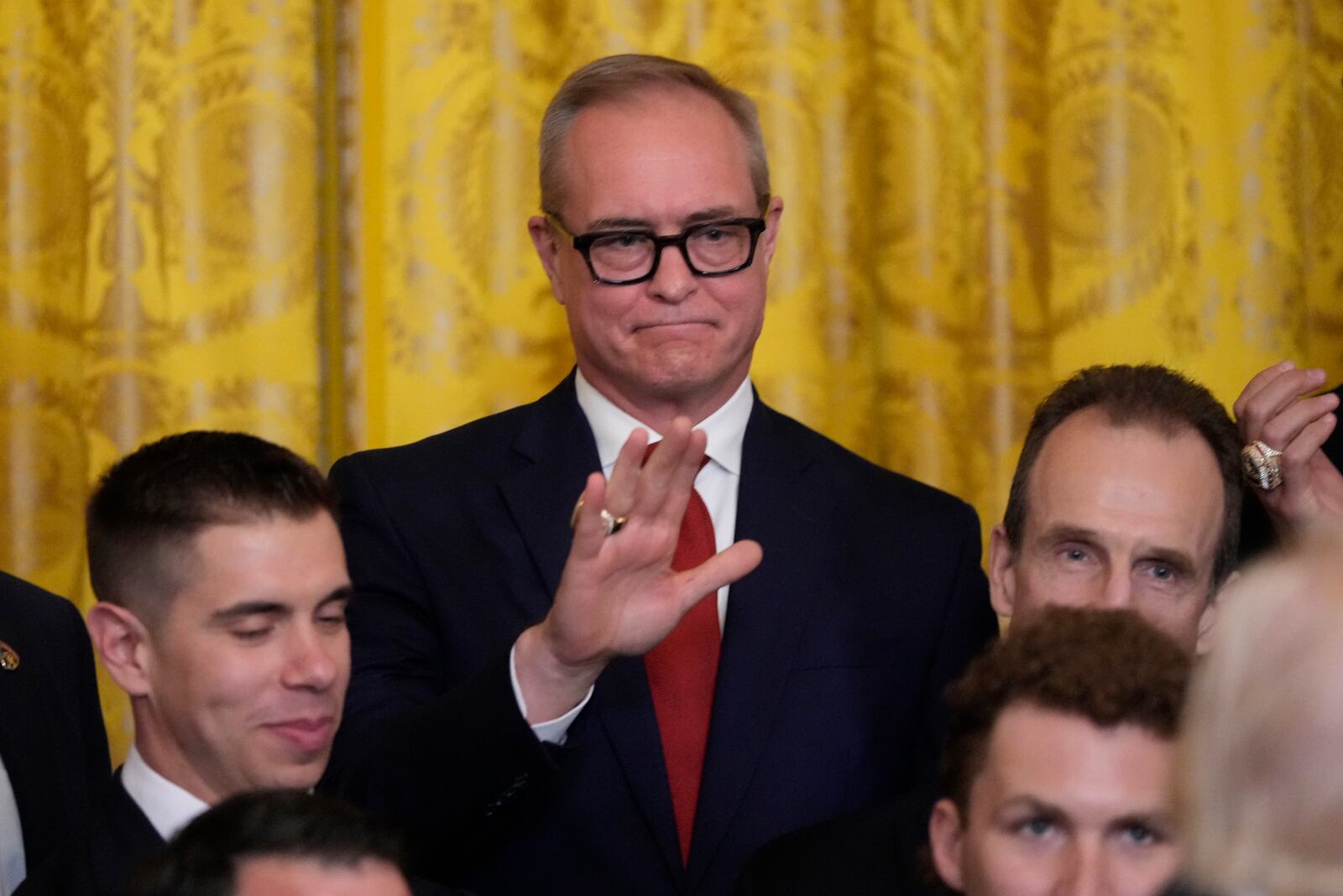 Florida Panthers head coach Paul Maurice waves before President Donald Trump speaks during a ceremony with the Florida Panthers NHL hockey team to celebrate their 2024 Stanley Cup victory in the East Room of the the White House, Monday, Feb. 3, 2025, in Washington. (AP Photo/Alex Brandon)