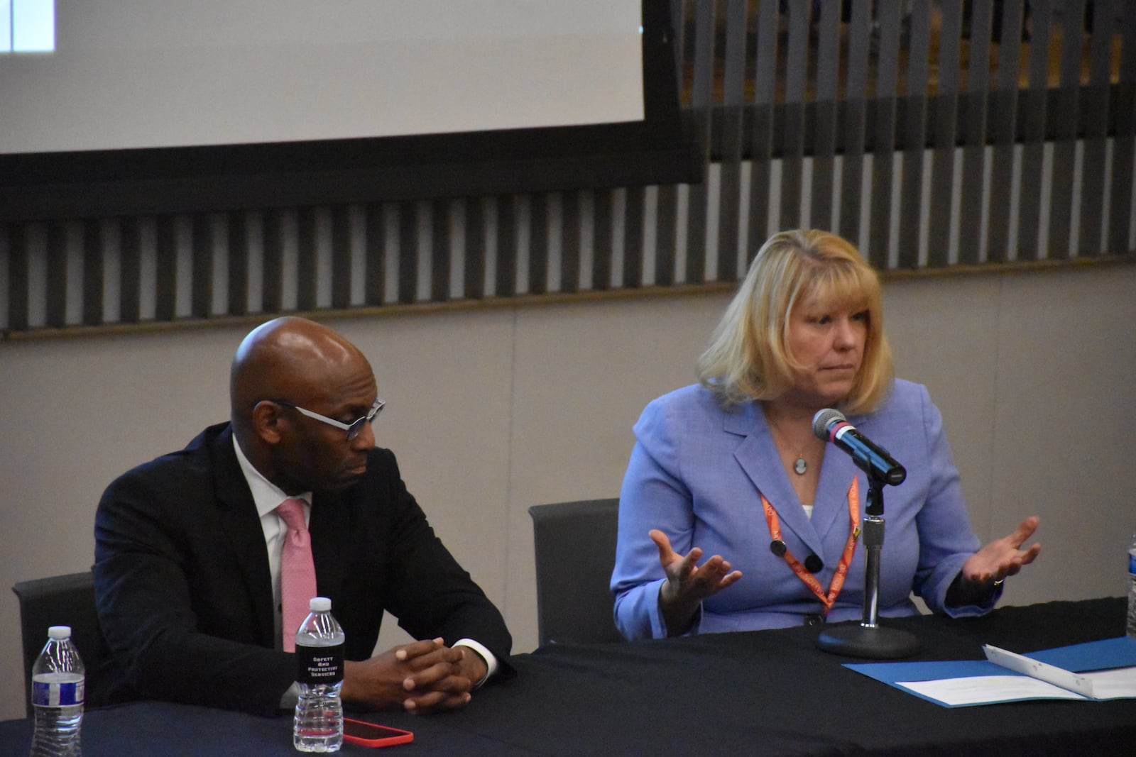 The downtown Dayton Metro Library hosted a panel discussion about public safety and youth issues at library facilities on Tuesday night. Dayton Public Schools Superintendent David Lawrence and Dayton Metro Library Deputy Executive Director Rachel Gut were two members of the four-person panel. CORNELIUS FROLIK / STAFF