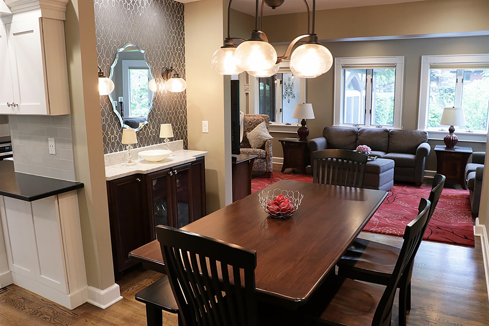 To the right off the foyer is the formal dining room with a wood-beam ceiling and hardwood floors. A butler’s pantry leads from the dining room into the kitchen. CONTRIBUTED PHOTO BY KATHY TYLER