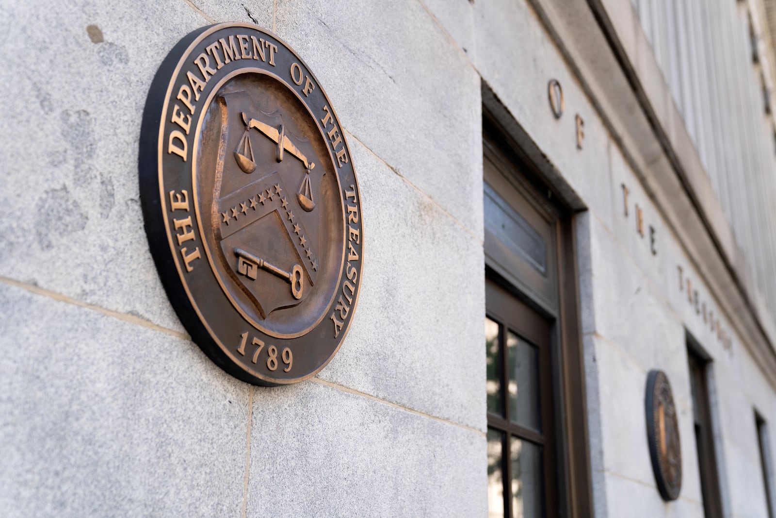 FILE — The US Treasury Department building in Washington on Aug. 10, 2021. Kraken, a cryptocurrency exchange that had been under investigation for violating U.S. sanctions, agreed to pay $360,000 to settle the allegations. (Stefani Reynolds/The New York Times)