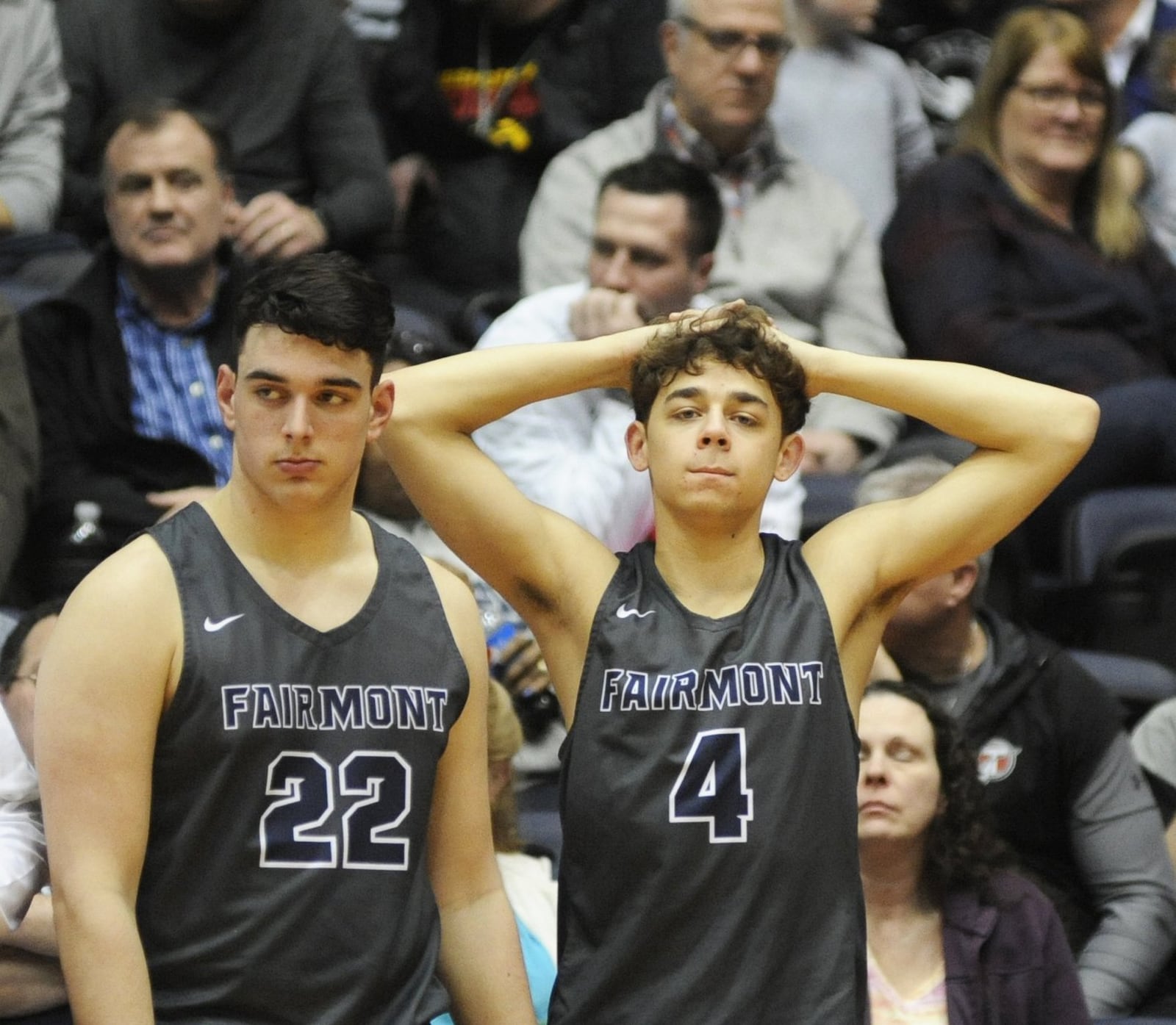 Chris Thompson (left) and Andre O’Daniel endure the final seconds. Lakota East defeated Fairmont 50-36 in a boys high school basketball D-I district final at UD Arena on Saturday, March 9, 2019. MARC PENDLETON / STAFF