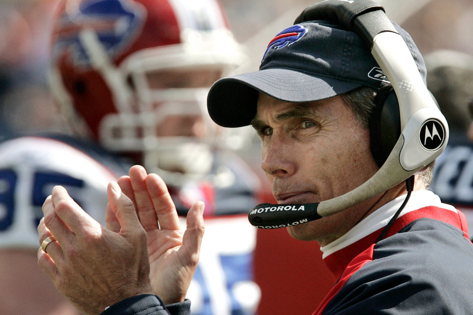 FILE - Buffalo Bills head coach Dick Jauron applauds as his defensive unit leaves the field in the second quarter against the New England Patriots during their football game in Foxborough, Mass., Sunday Sept. 10, 2006. (AP Photo/Charles Krupa, File)