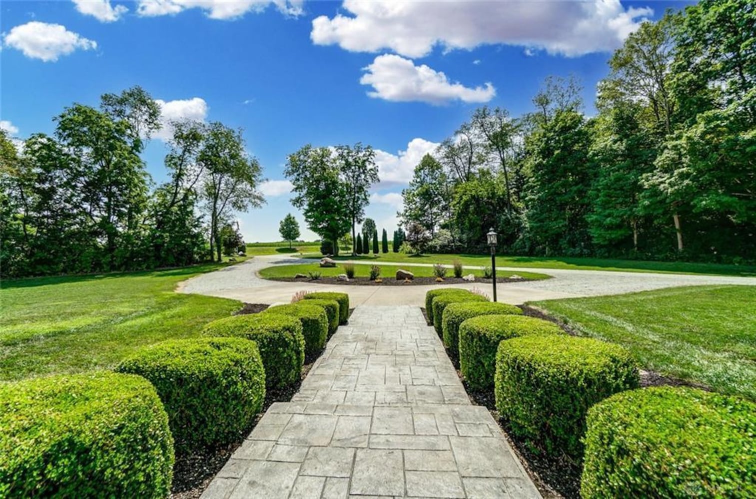 PHOTOS: $1.59M Miami County luxury home on 45-acre property