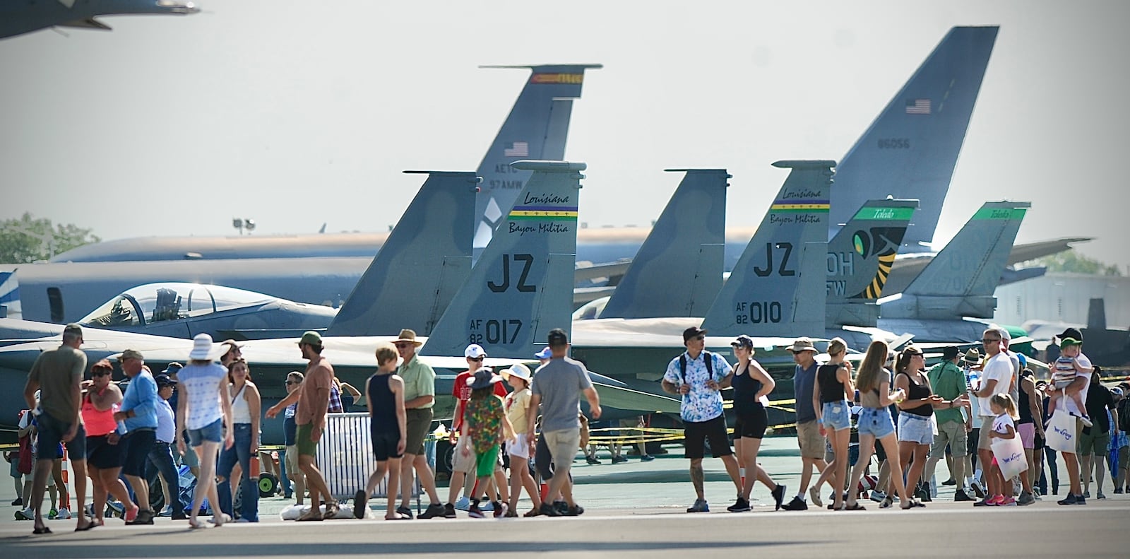 Dayton Air Show attendants wait to see inside several aircrafts on display on Sunday, July 23, 2023. MARSHALL GORBY \STAFF