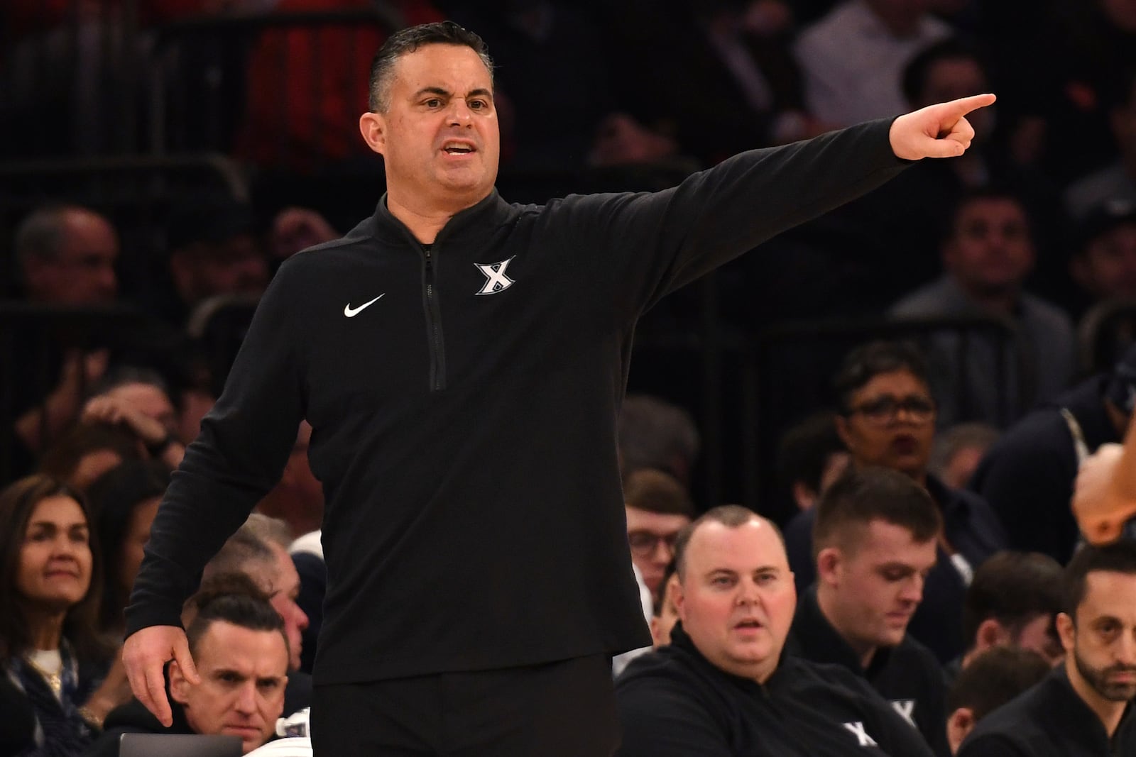 Xavier head coach Sean Miller yells on the court during the first half of an NCAA college basketball game against St. John's, Wednesday, Jan. 22, 2025, in New York. (AP Photo/Pamela Smith)