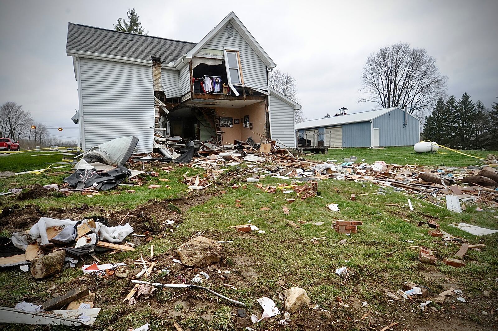 A semi drove through a house Thursday evening, March 30, 2023, at state Routes 571 and 201 in Bethel Twp. Homeowner Dave Fisher said Friday that his wife was inside but only suffered minor injuries. The house will be demolished and rebuilt, he said. MARSHALL GORBY \STAFF