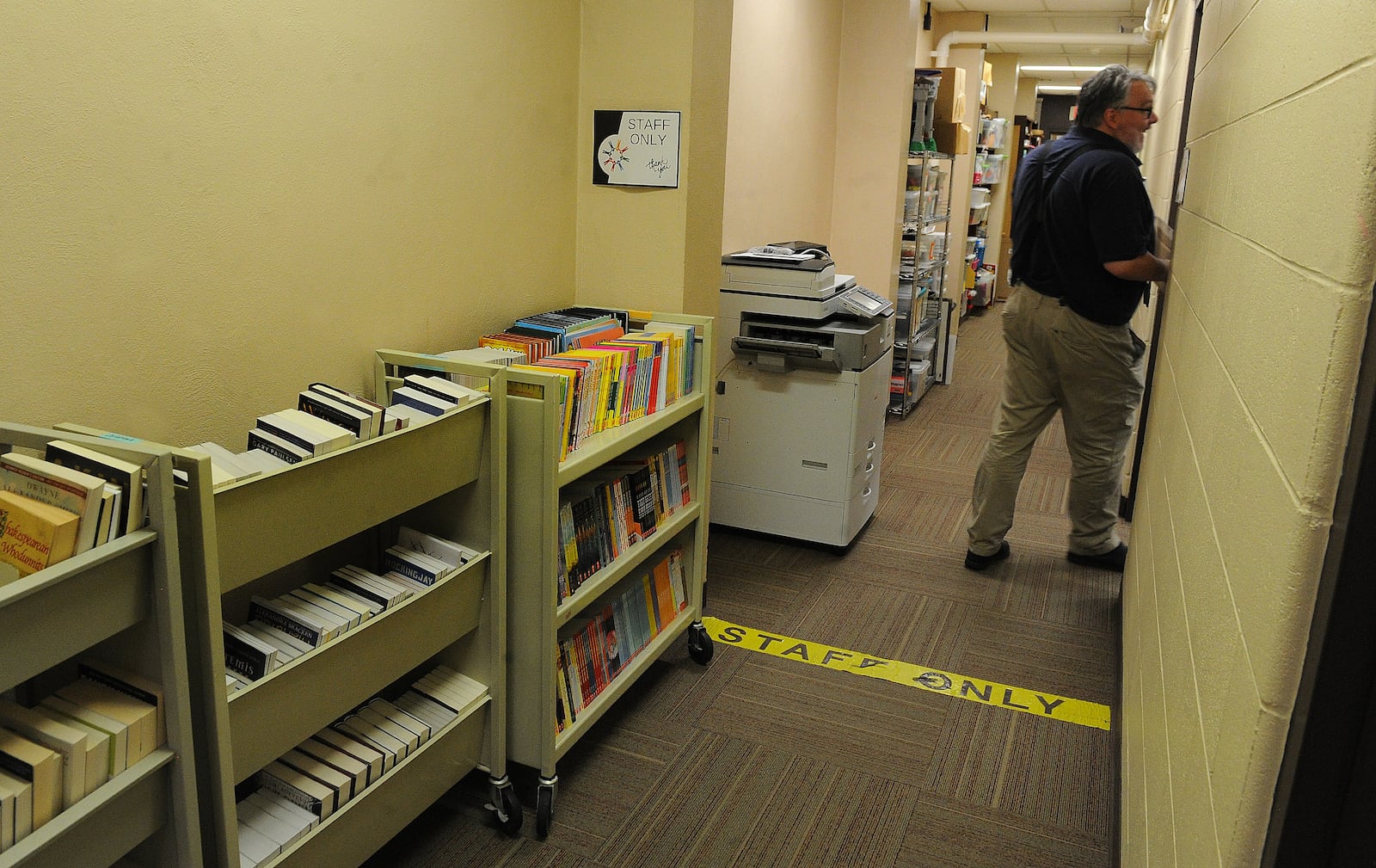 Hallways at the Troy-Miami County Public Library are used for storage due to lack of storage space. MARSHALL GORBY\STAFF