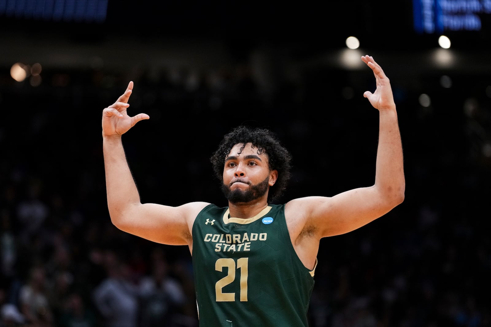 Colorado State forward Rashaan Mbemba gestures to the crowd in the final seconds of the game to celebrate a 78-70 win over Memphis during the second half in the first round of the NCAA college basketball tournament, Friday, March 21, 2025 in Seattle. (AP Photo/Lindsey Wasson)