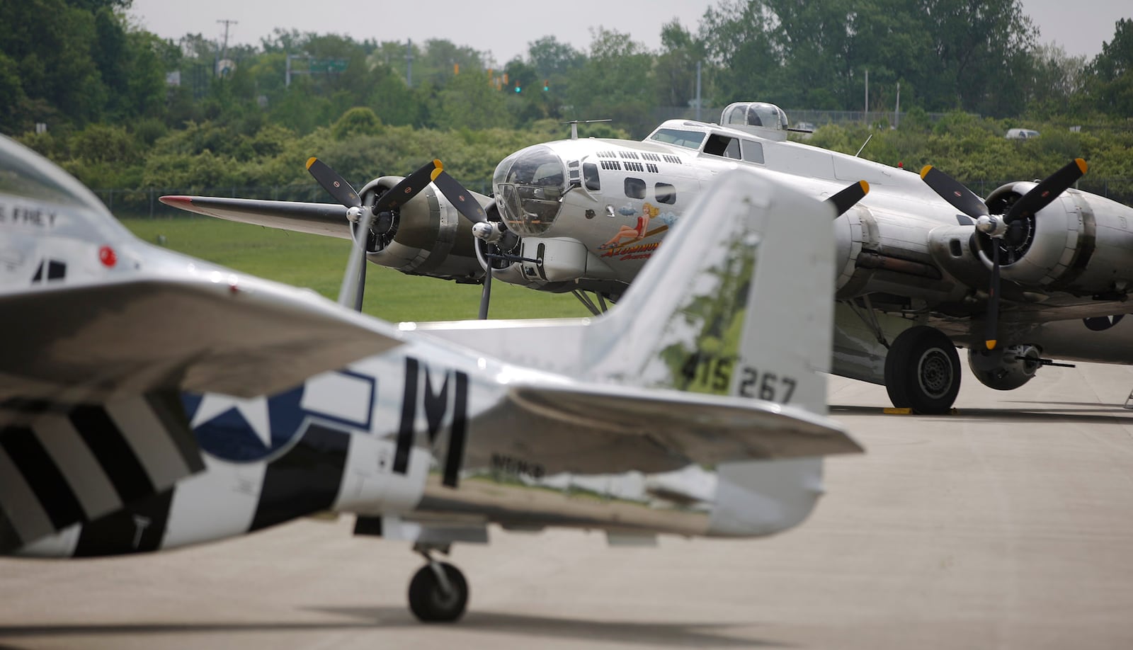 P-51 Mustang Ain't Misbehavin' and B-17 Aluminum Overcast at The National Museum of the U.S. Air Force.  The Memphis Belle exhibit opened to the public on Thursday after a 13-year restoration.  Staff and volunteers worked 55,000 hours to restore the iconic World War II bomber.    TY GREENLEES / STAFF