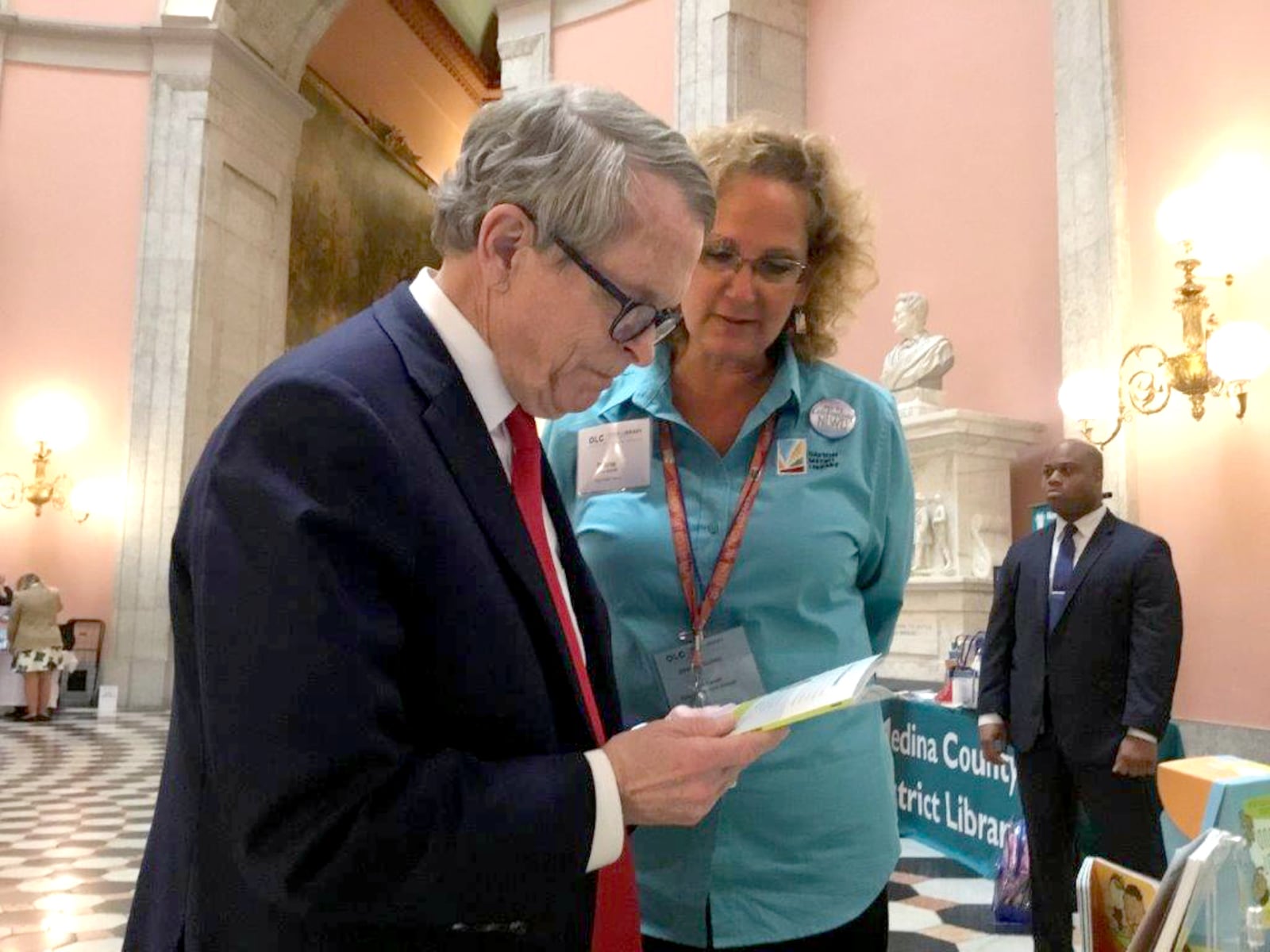 Diane Farrell talking with Gov. Mike DeWine about Dayton Metro Library's new third grade reading program during Legislative Day.  CONTRIBUTED PHOTO