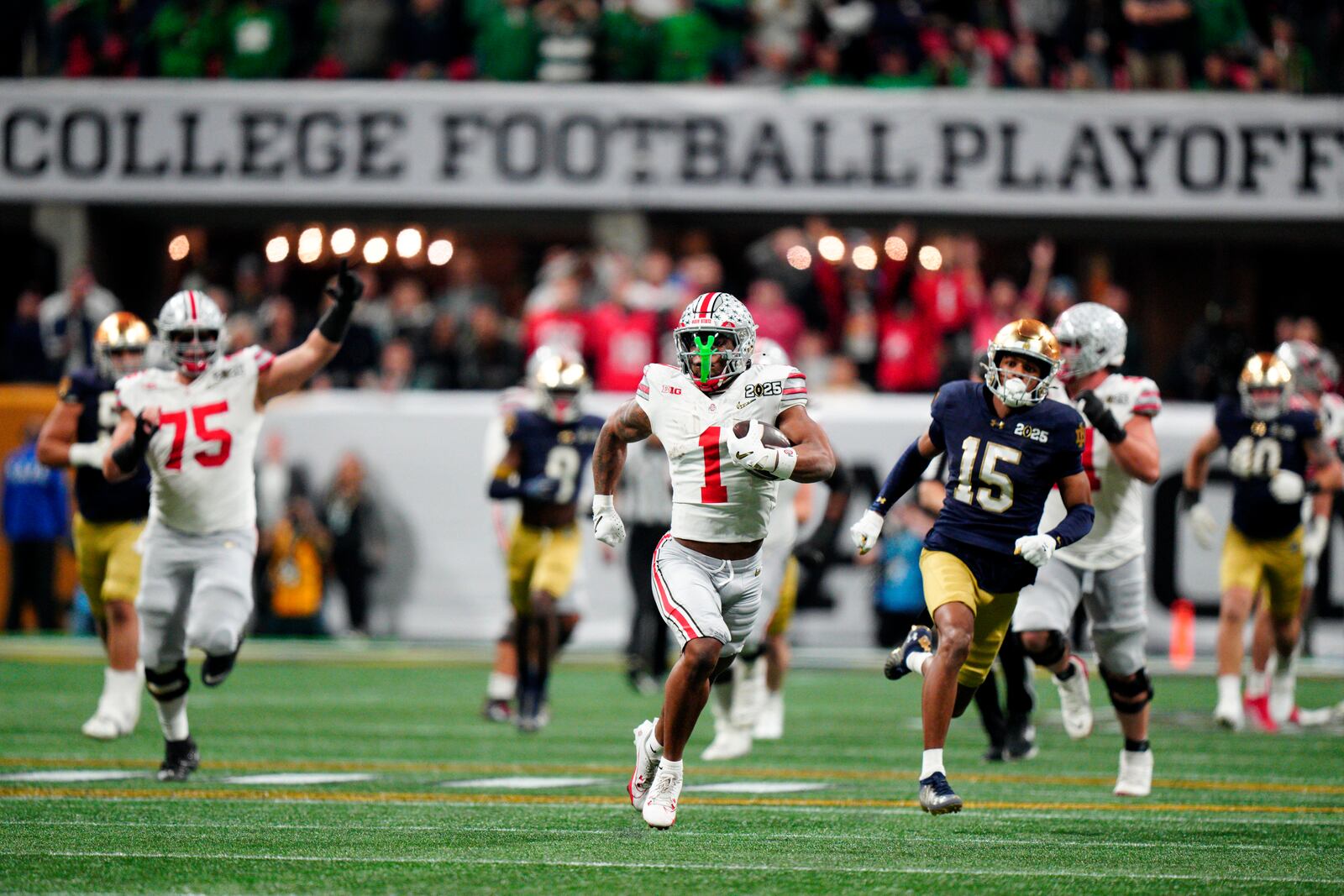 Ohio State running back Quinshon Judkins runs against Notre Dame during second half of the College Football Playoff national championship game Monday, Jan. 20, 2025, in Atlanta. (AP Photo/Jacob Kupferman)