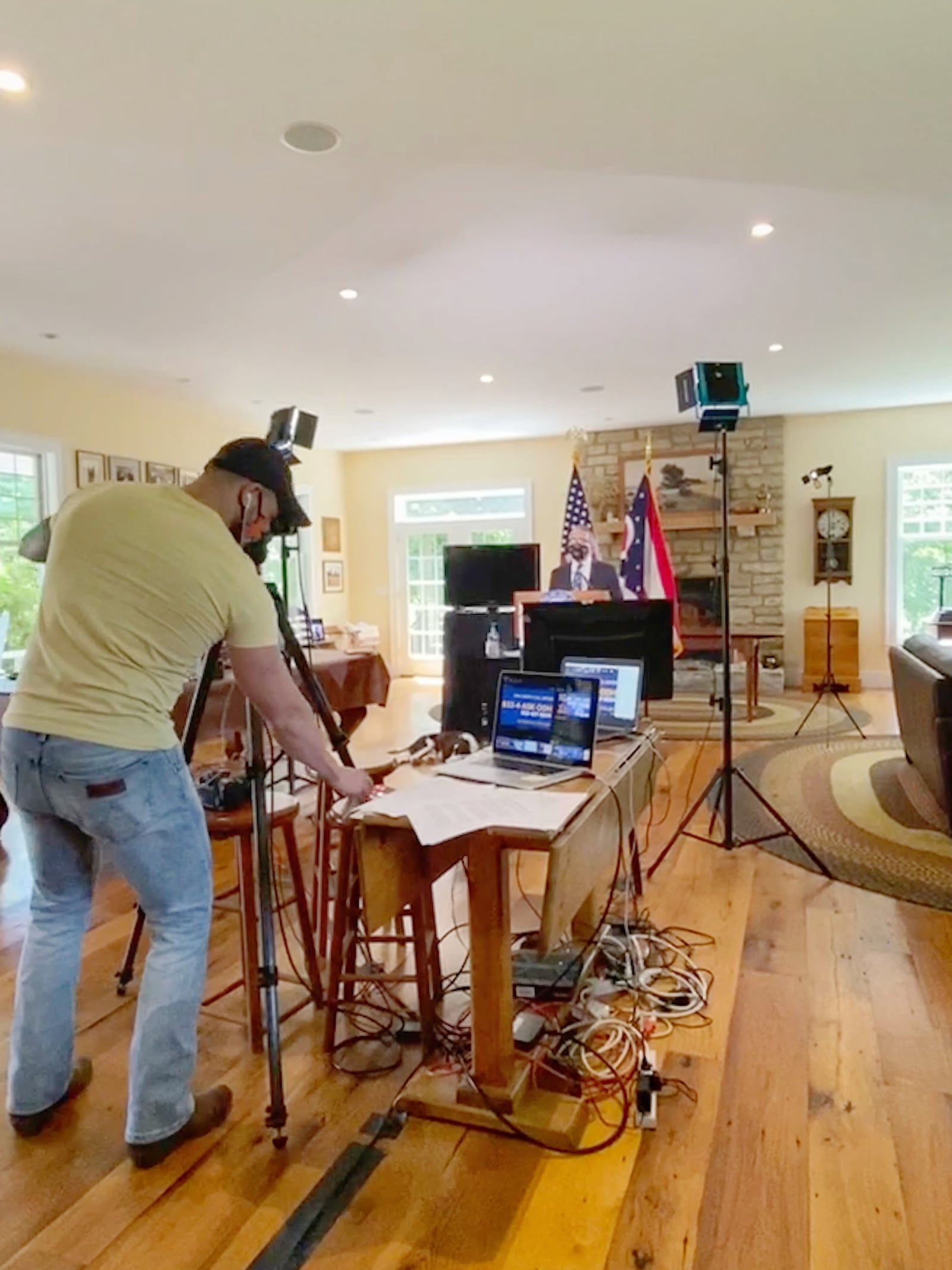 Videographer Eric Porter runs the camera during Gov. Mike DeWine's coronavirus press briefings. The briefings are staged at guest house on DeWine's Greene County farm.