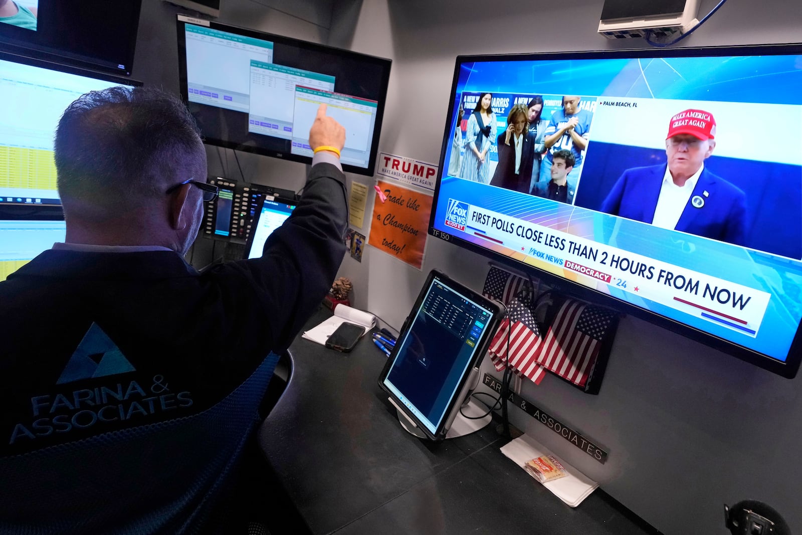 Trader Robert Arciero works on the floor of the New York Stock Exchange, Tuesday, Nov. 5, 2024. (AP Photo/Richard Drew)