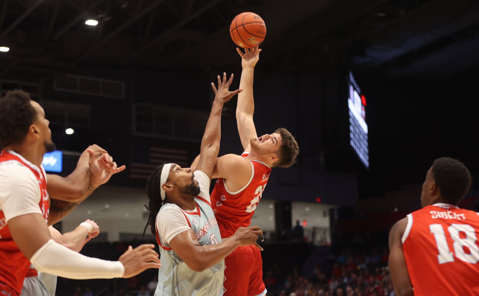 The Red Scare's Grant Basile shoots against Carmen's Crew in the second round of The Basketball Tournament on Monday, July 22, 2024, at UD Arena. David Jablonski/Staff