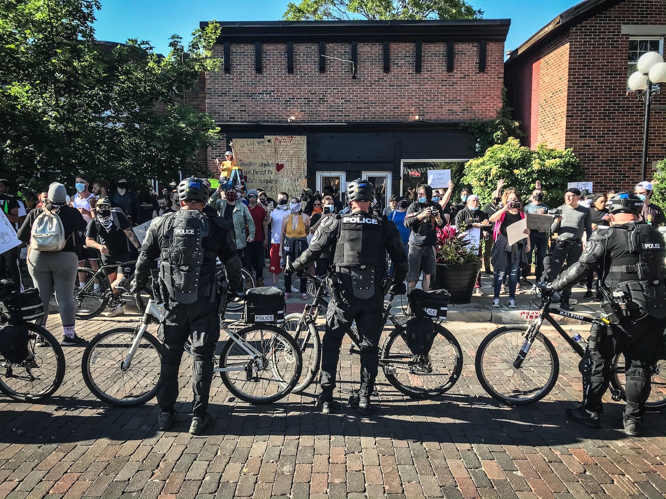 PHOTOS: Protesters gather at Courthouse Square Sunday