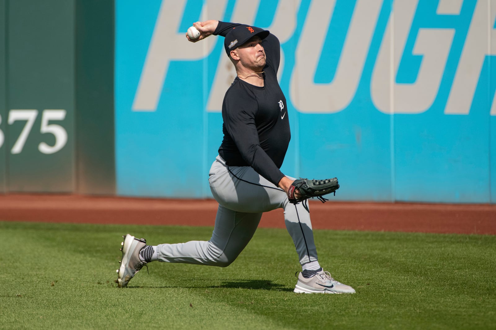 Detroit Tigers starting pitcher Tarik Skubal warms up during a baseball workout in Cleveland, Friday, Oct. 11, 2024, in preparation for Saturday's Game 5 of the American League Division Series, against the Cleveland Guardians Saturday. (AP Photo/Phil Long)