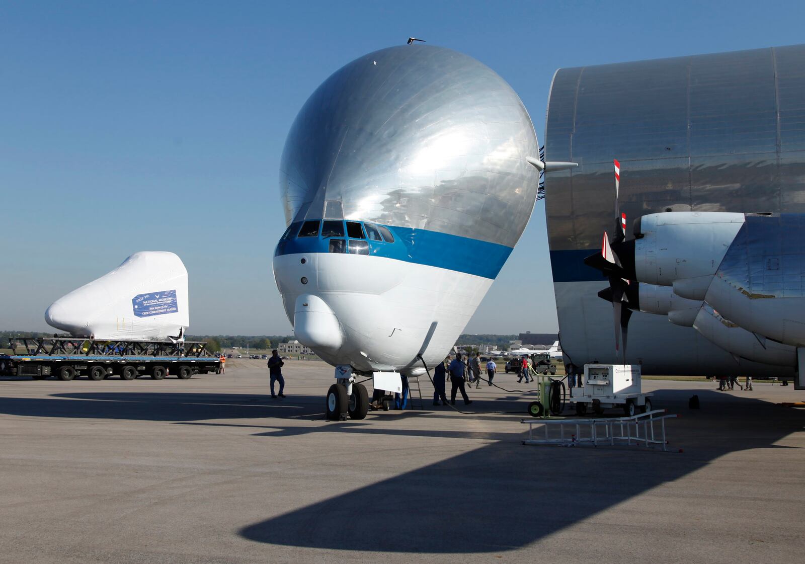 The Space Shuttle Crew Compartment Trainer destined for the National Musuem of the United States Air Force was moved from the NASA Super Guppy transport airplane into the museum on Thursday, August 23.--Staff Photo by Ty Greenlees