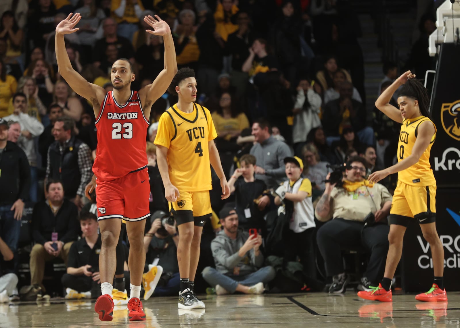 Dayton's Zed Key celebrates after a victory against Virginia Commonwealth on Friday, March 7, 2025, at the Siegel Center in Richmond, Va. David Jablonski/Staff