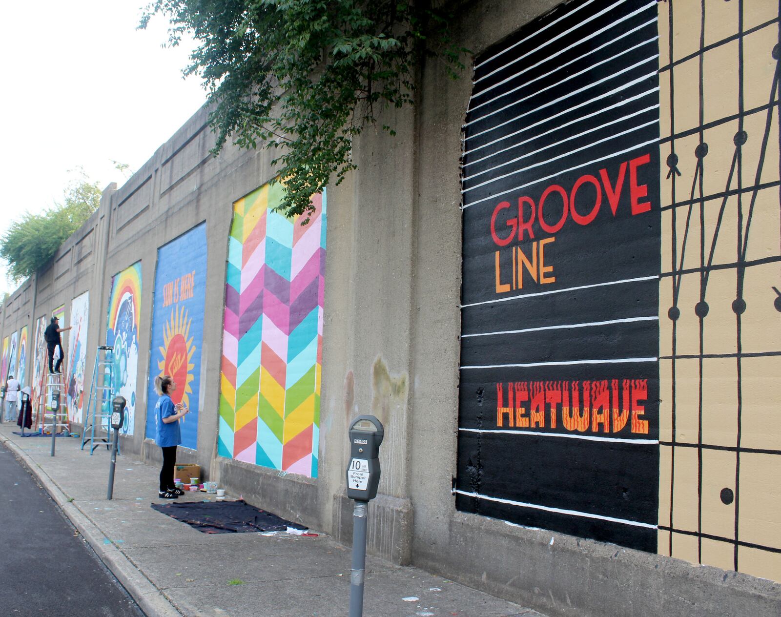 Dayton artist Morris Howard and Brittini Long of Montgomery County Juvenile Court are leading an effort to create a funk wall on Stone Street.