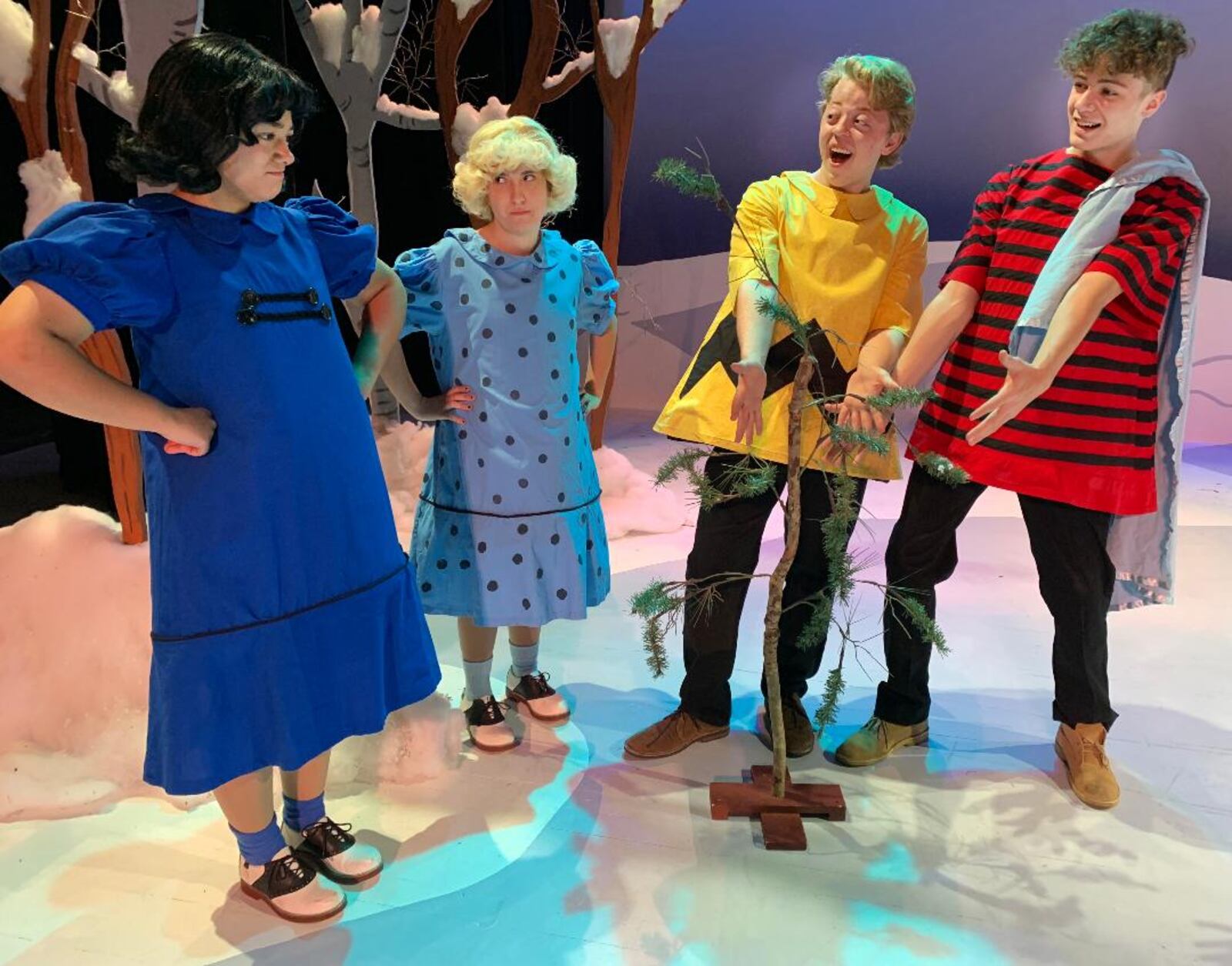 left to right: Alexis Paige (Lucy), Helen Grisez (Sally), Colin Drayer (Charlie Brown) and Ian Spraul (Linus) in Sinclair Community College's production of "A Charlie Brown Christmas."