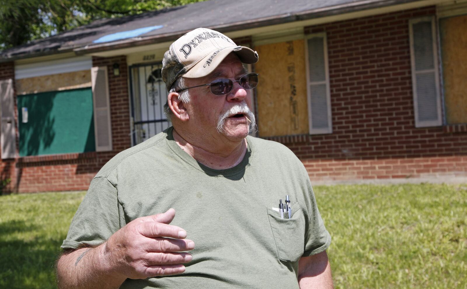 Luke Clark talks about Trotwood Community Improvement Corp’s housing rehab program and its impact in his neighborhood. TY GREENLEES / STAFF