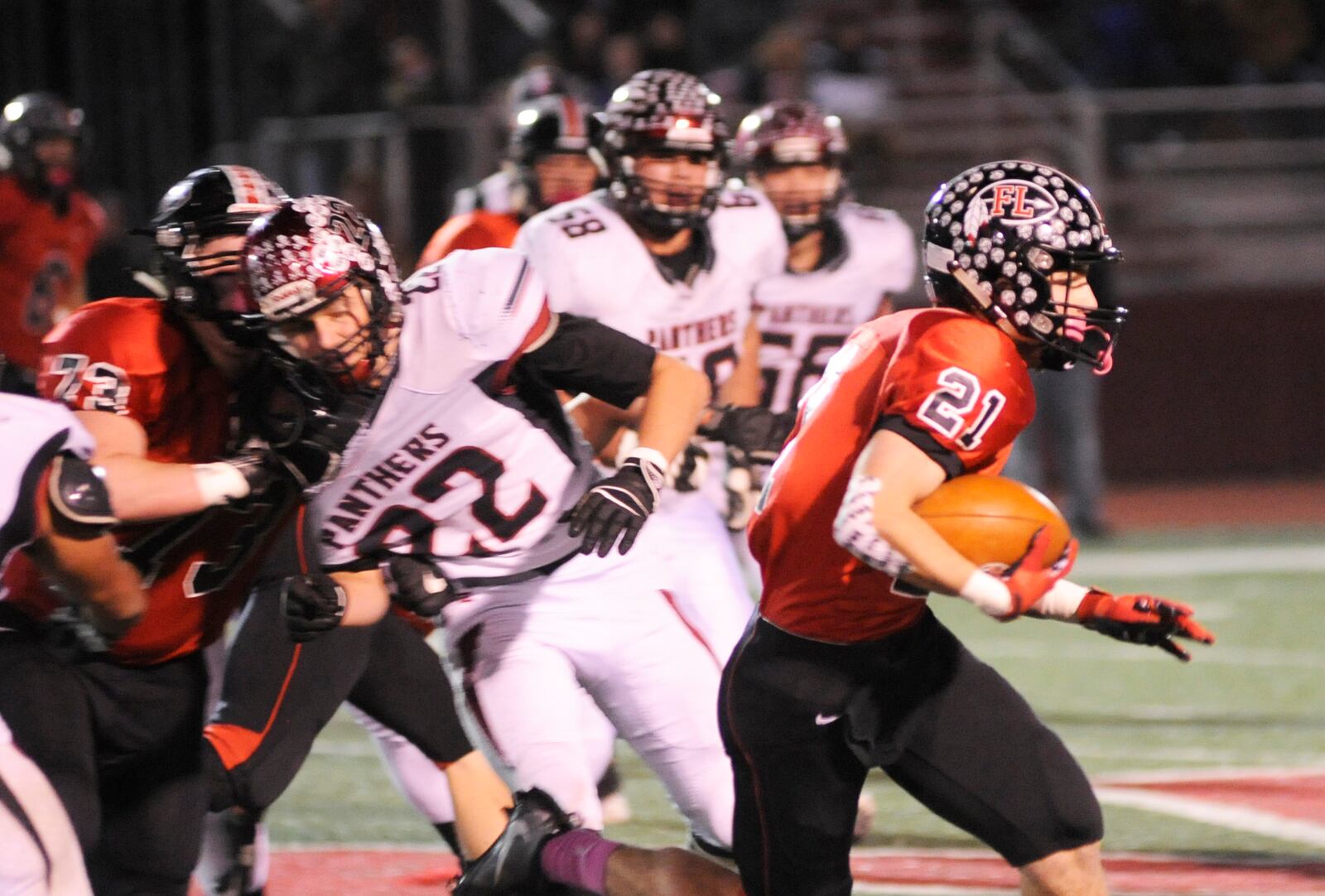 Fort Loramie’s Carter Mescher looks for running room. McComb defeated Fort Loramie 28-14 in a D-VII high school football state semifinal at Wapakoneta on Saturday, Nov. 24, 2018. MARC PENDLETON / STAFF