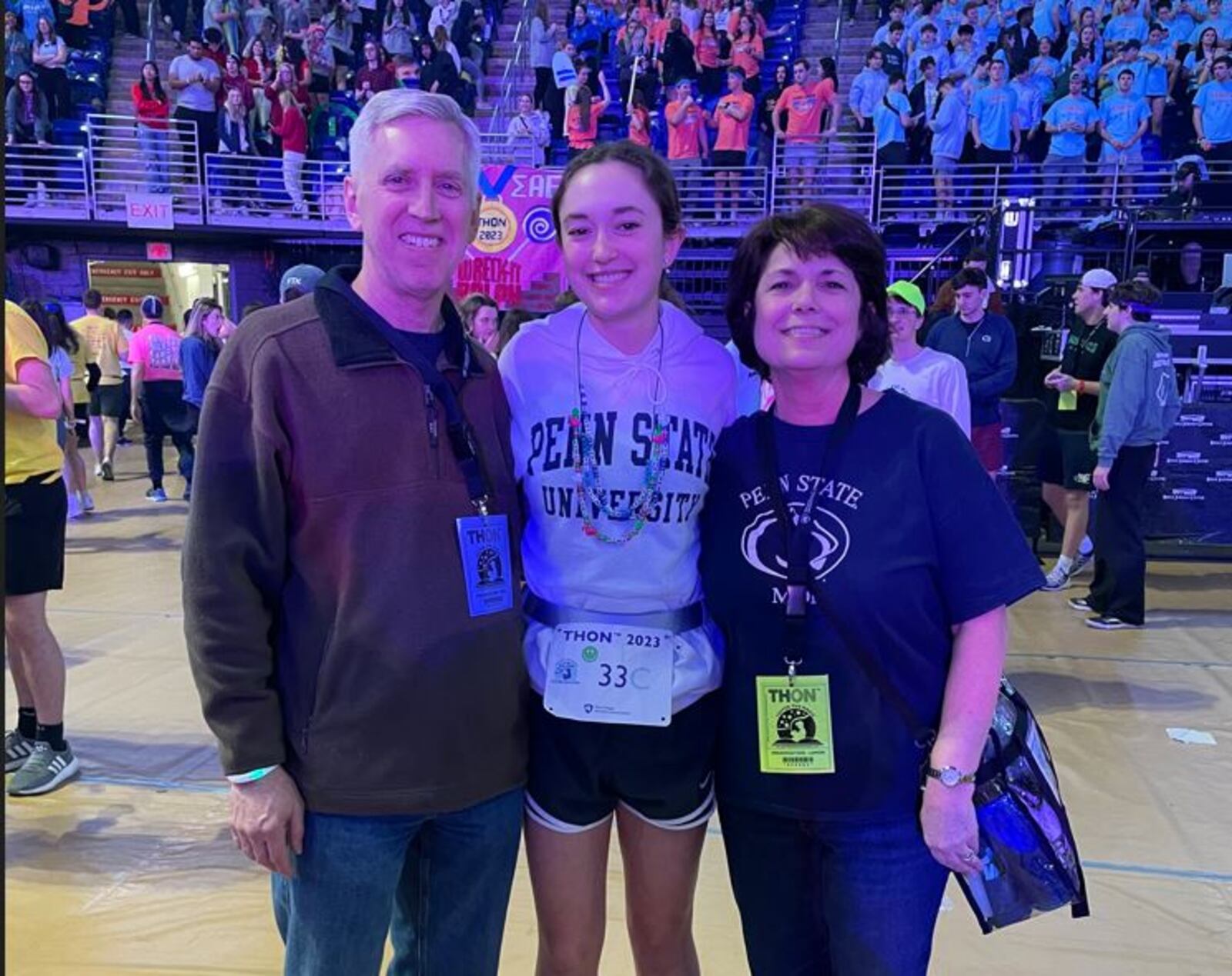 Kaitlyn Buell with her parents at the THON. 