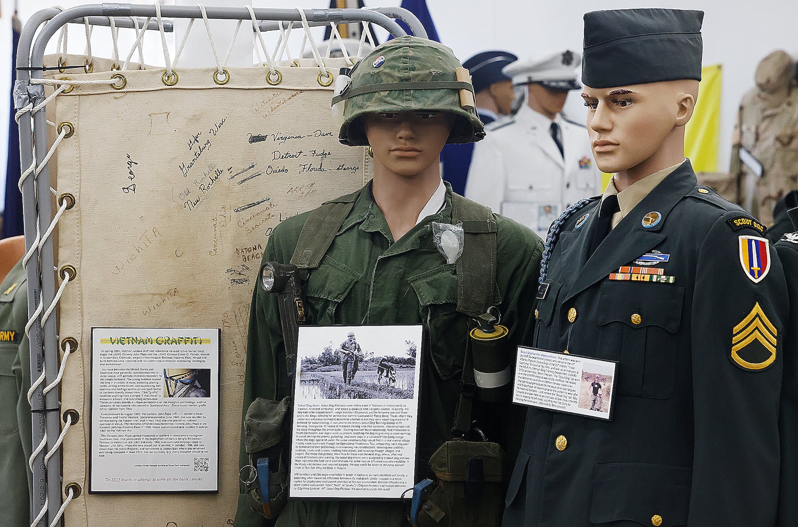 Several military uniforms are on display at the Miami Valley Military History Museum in Fairborn. The museum is planning a event to mark the 50th anniversary to mark the end of the Vietnam War. MARSHALL GORBY\STAFF