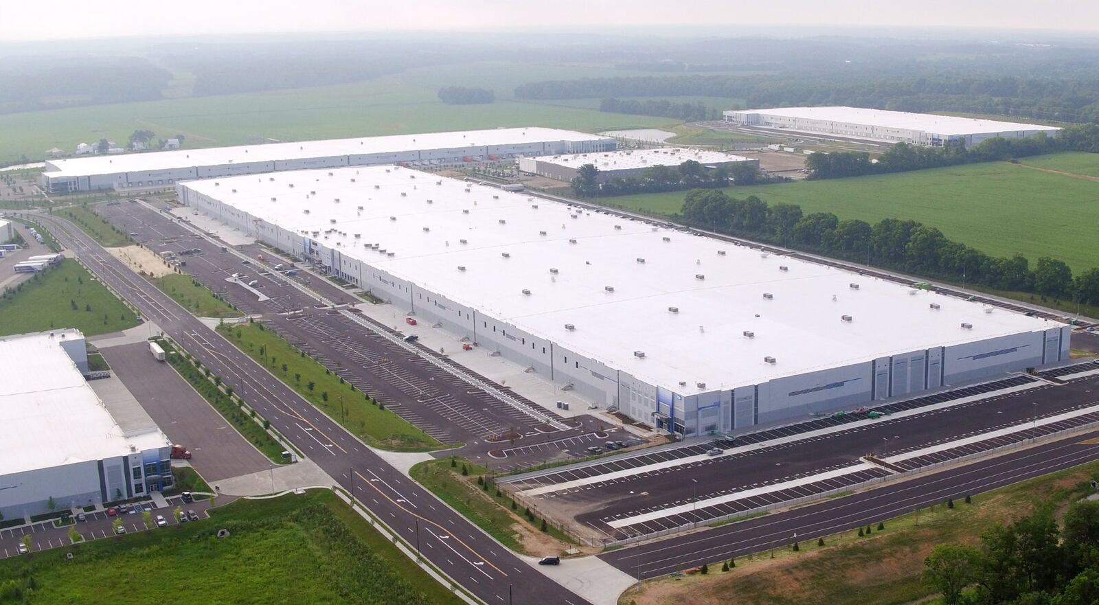 Giant warehouses cover Park North in Monroe where Amazon recently built a million-square-foot distribution center. TY GREENLEES / STAFF