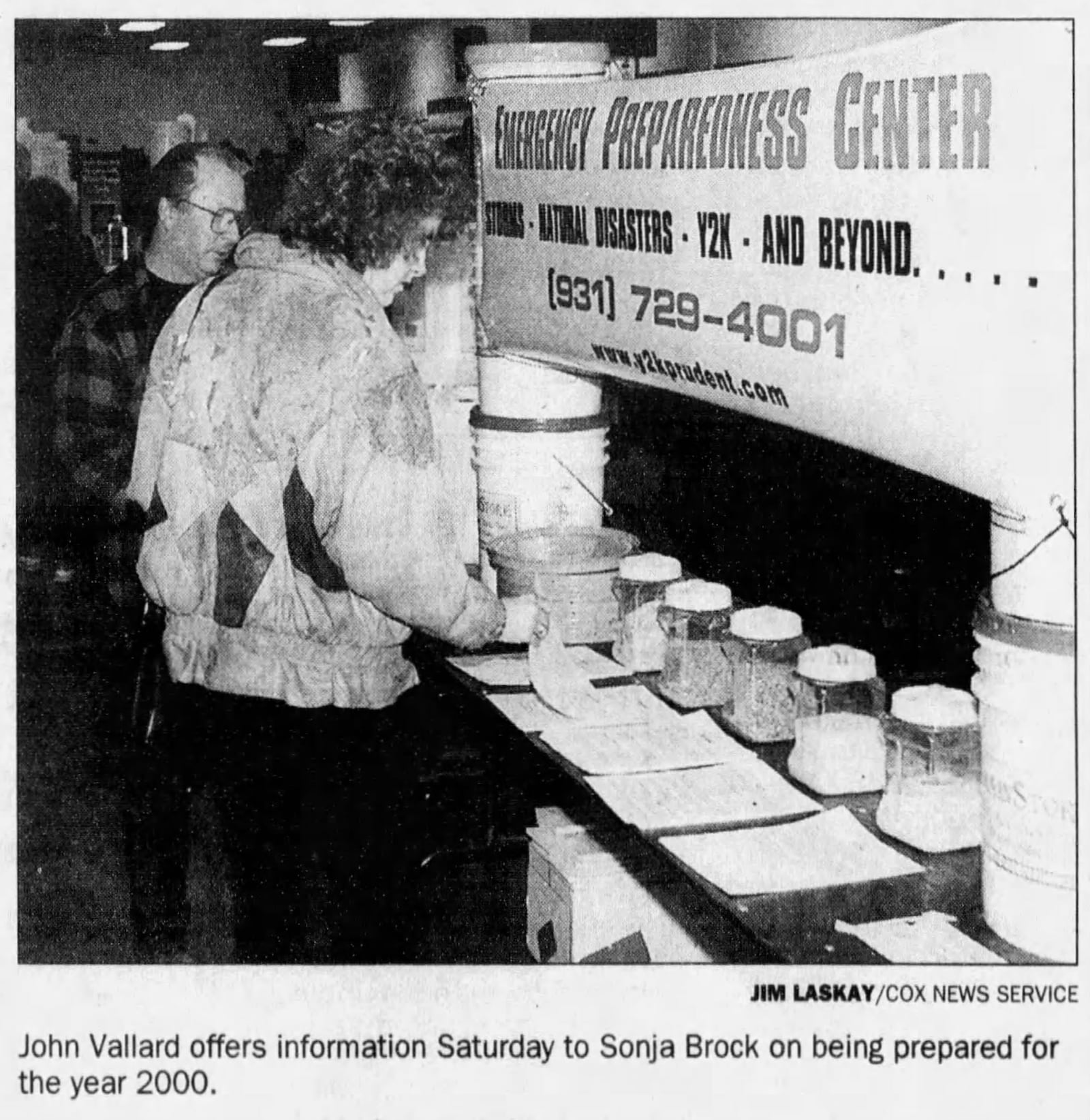 john Vallard offers information to Sonja Brock on being prepared for the year 2000. DAYTON DAILY NEWS ARCHIVES