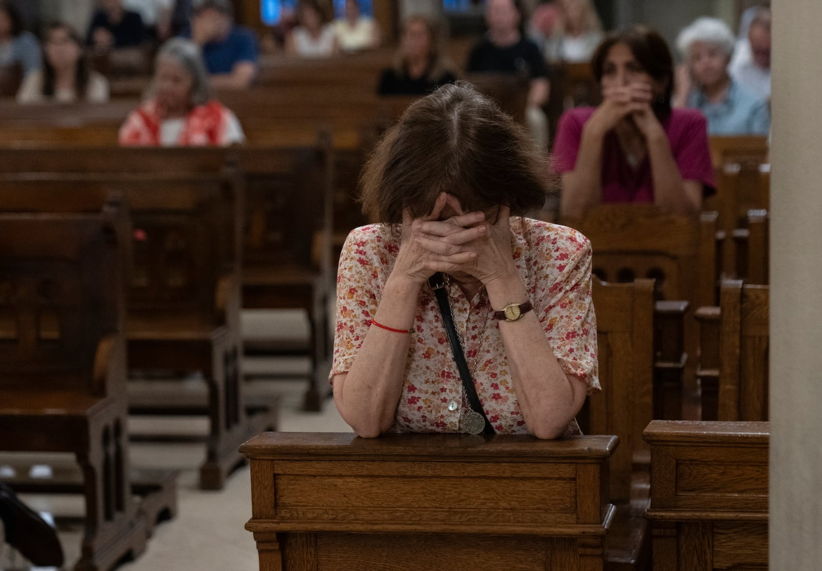 Faithful pray for Pope Francis' health during a Mass in Buenos Aires, Argentina, Wednesday, Feb. 19, 2025. (AP Photo/Rodrigo Abd)